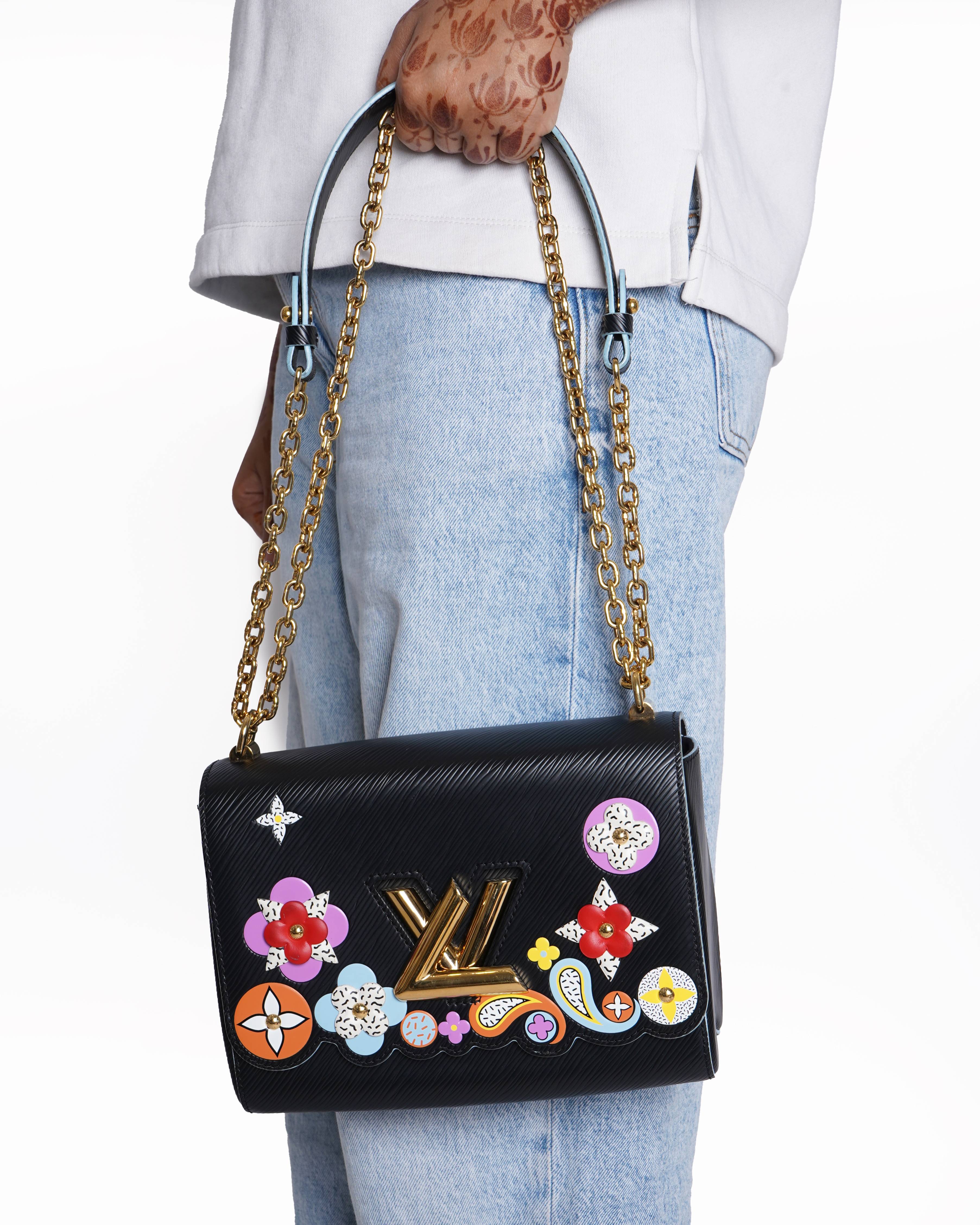 Louis vuitton epi leather blooming flowers twist mm bag