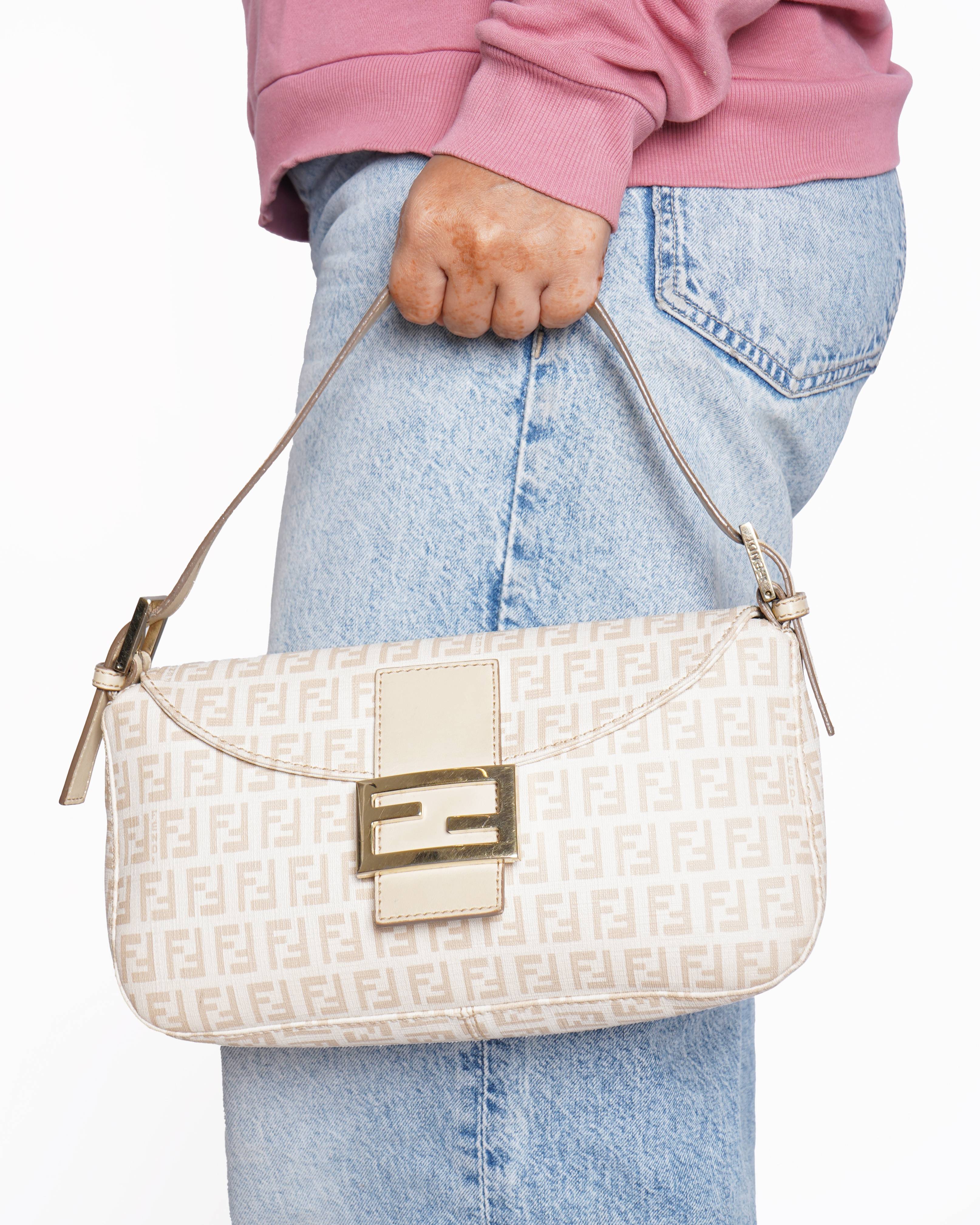 Fendi
Zucchino Canvas Mamma Baguette Shoulder Bag Beige