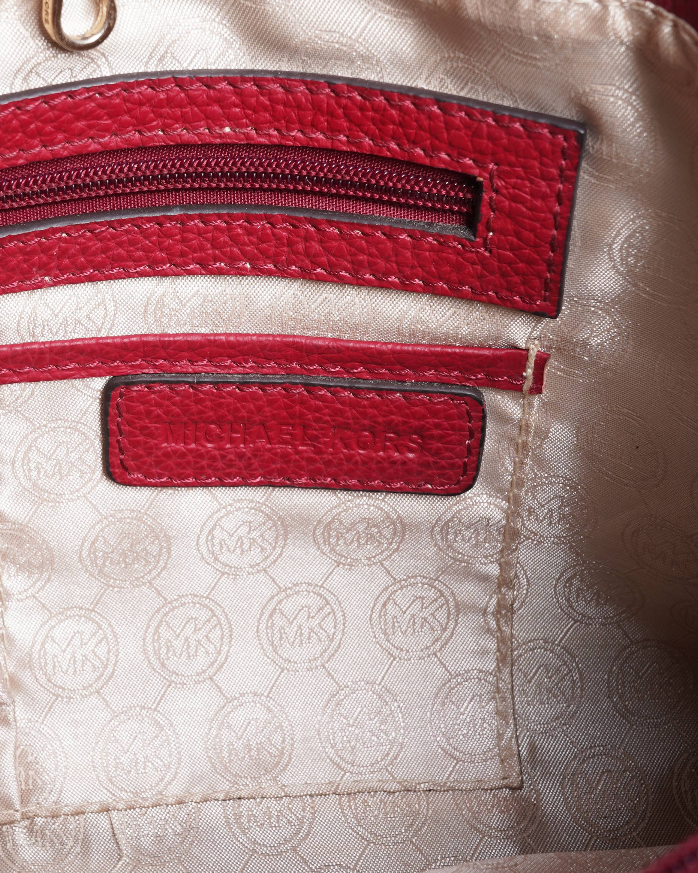 Michael Kors 
Red jet set tote