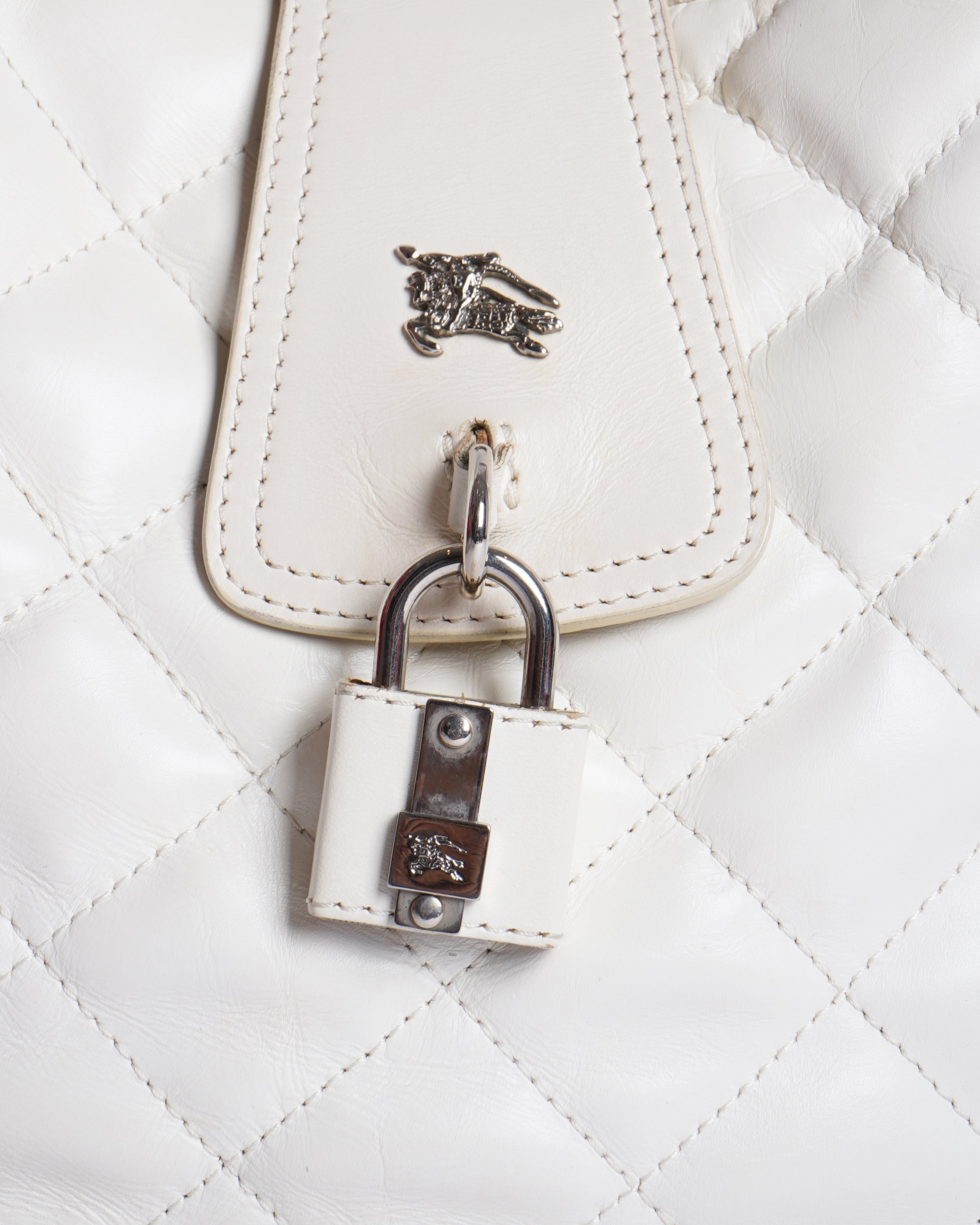 Burberry 
White quilted leather brook hobo bag