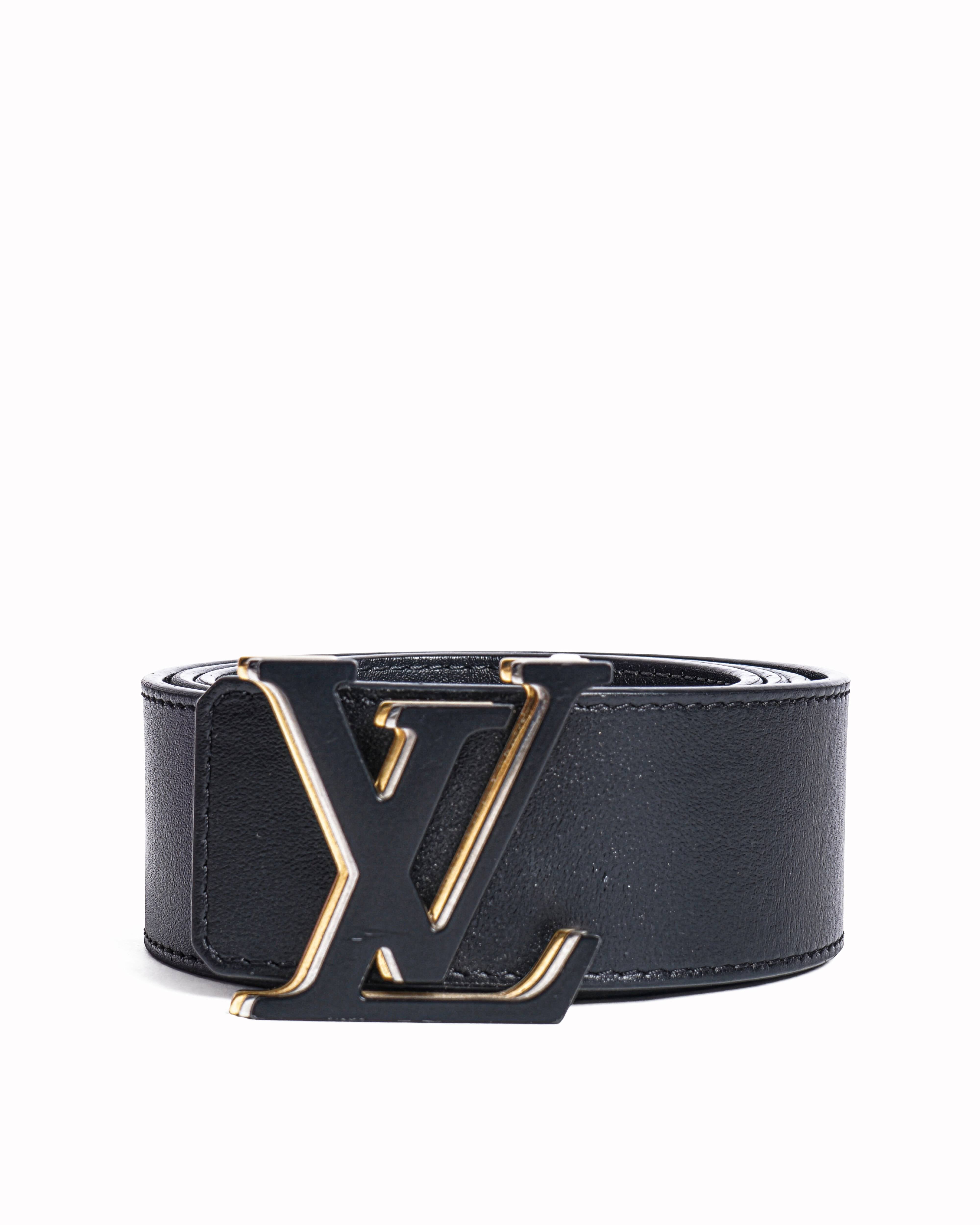 Louis Vuitton 
Black leather belt
