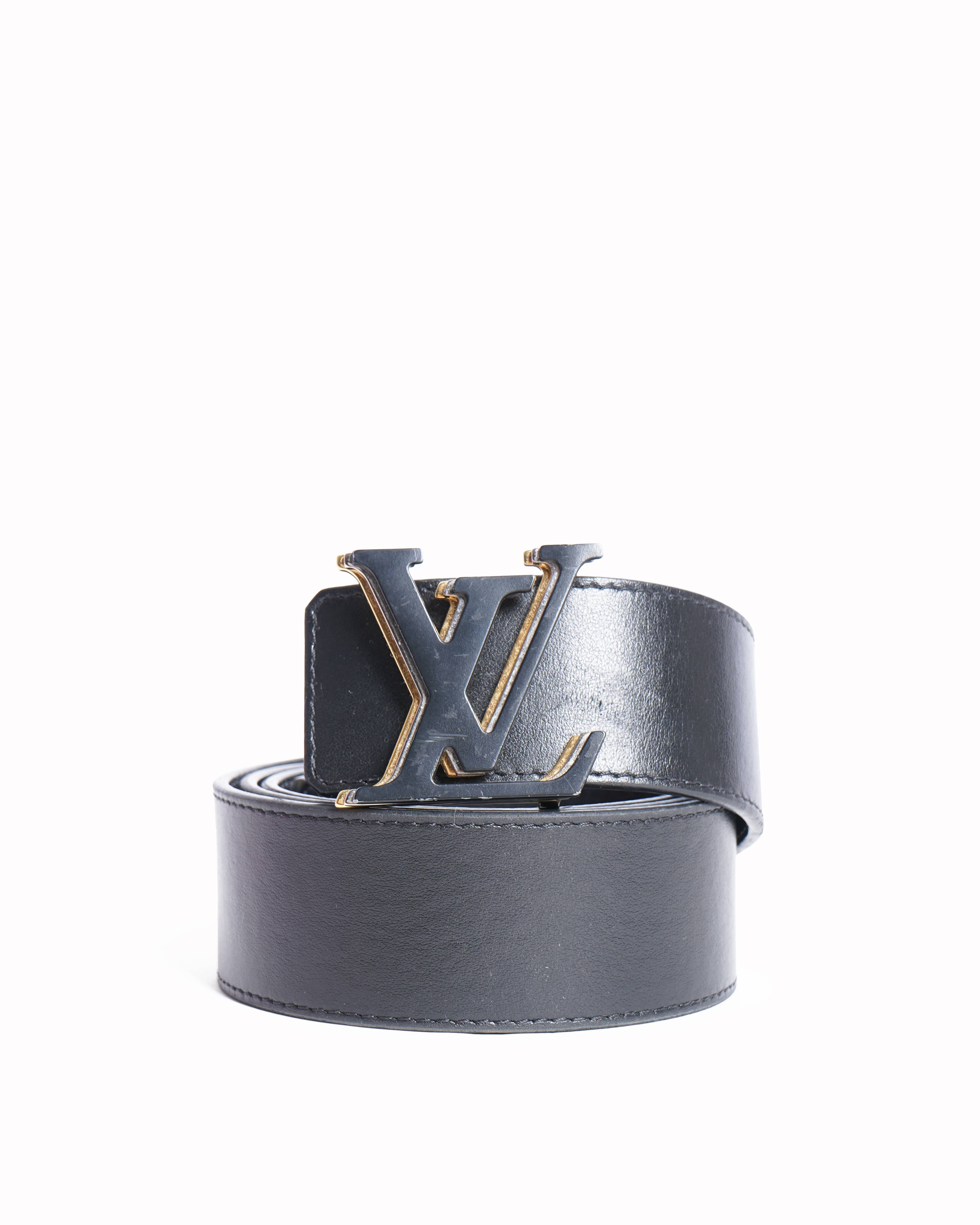 Louis Vuitton 
Black leather belt