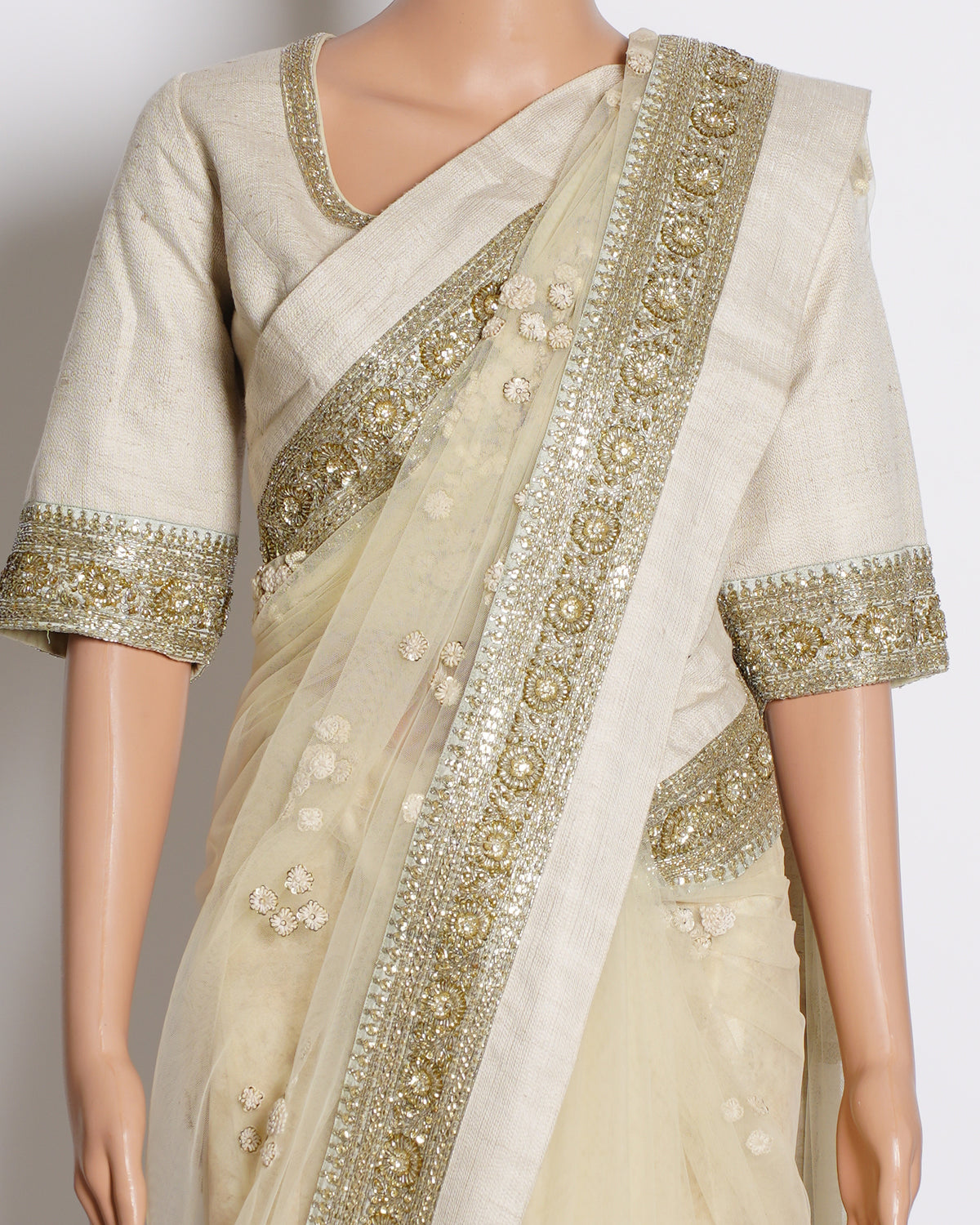 Sabyasachi off white embroidered net & silk saree with Blouse