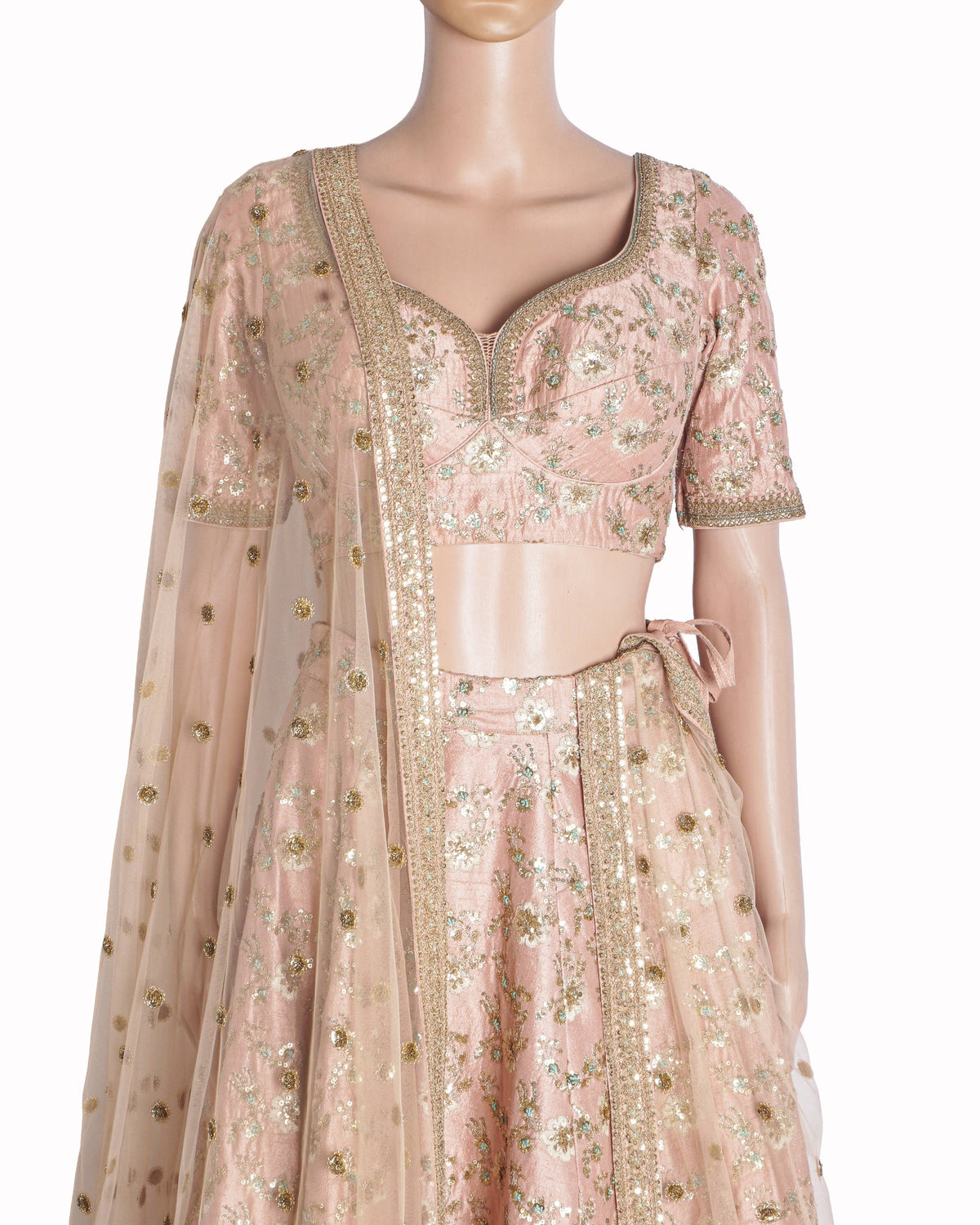 Sabyasachi Peach Silk Embroidered Lehenga Set with Potli