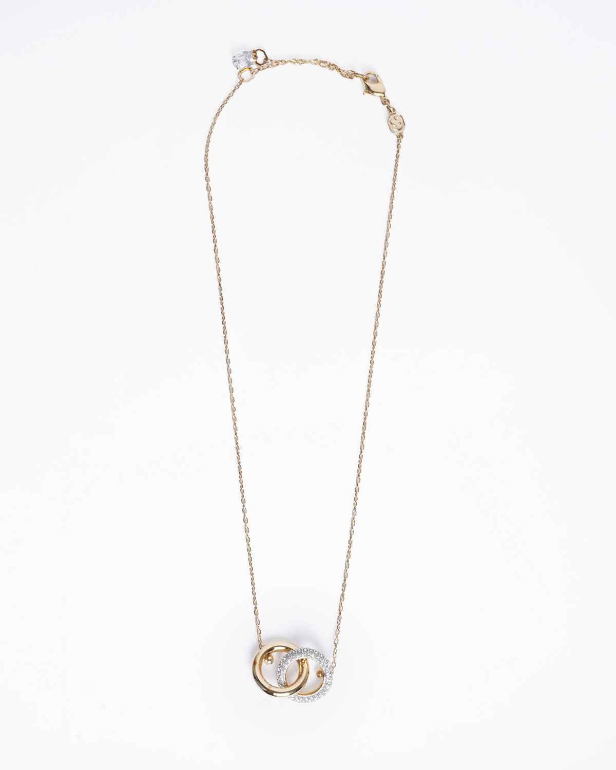 New Swarovski Dextera Gold-Tone Interlocking Loop Pendant with White Crystals
