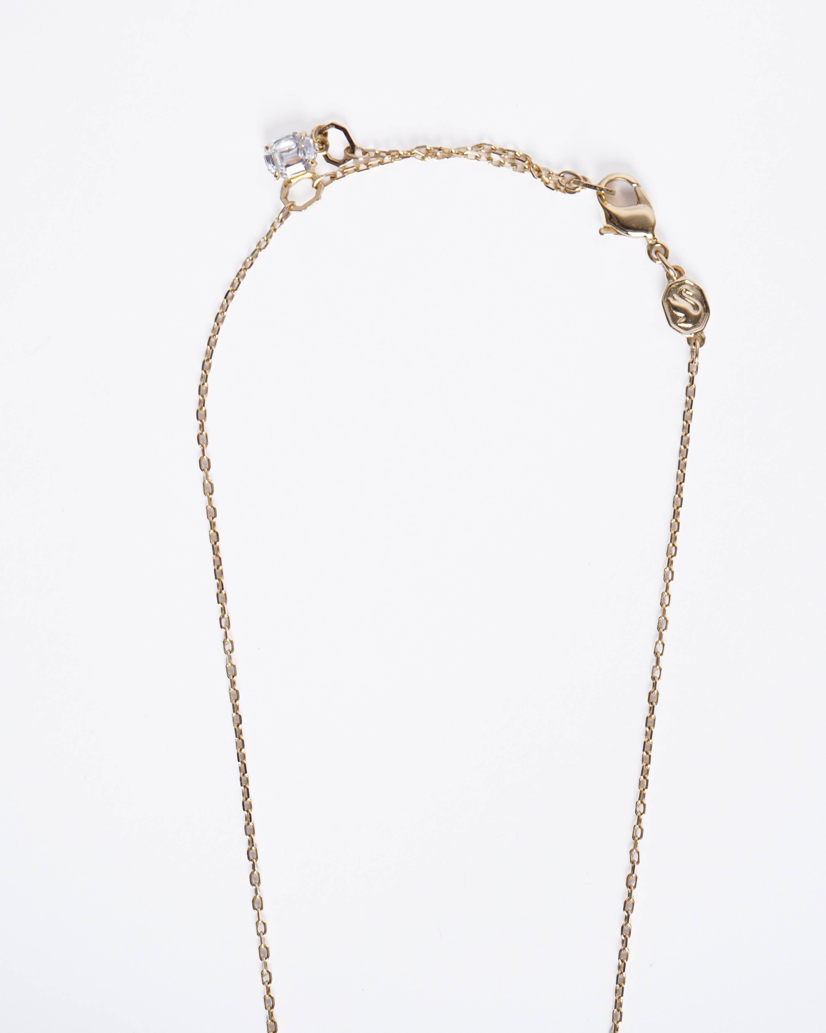 New Swarovski Dextera Gold-Tone Interlocking Loop Pendant with White Crystals