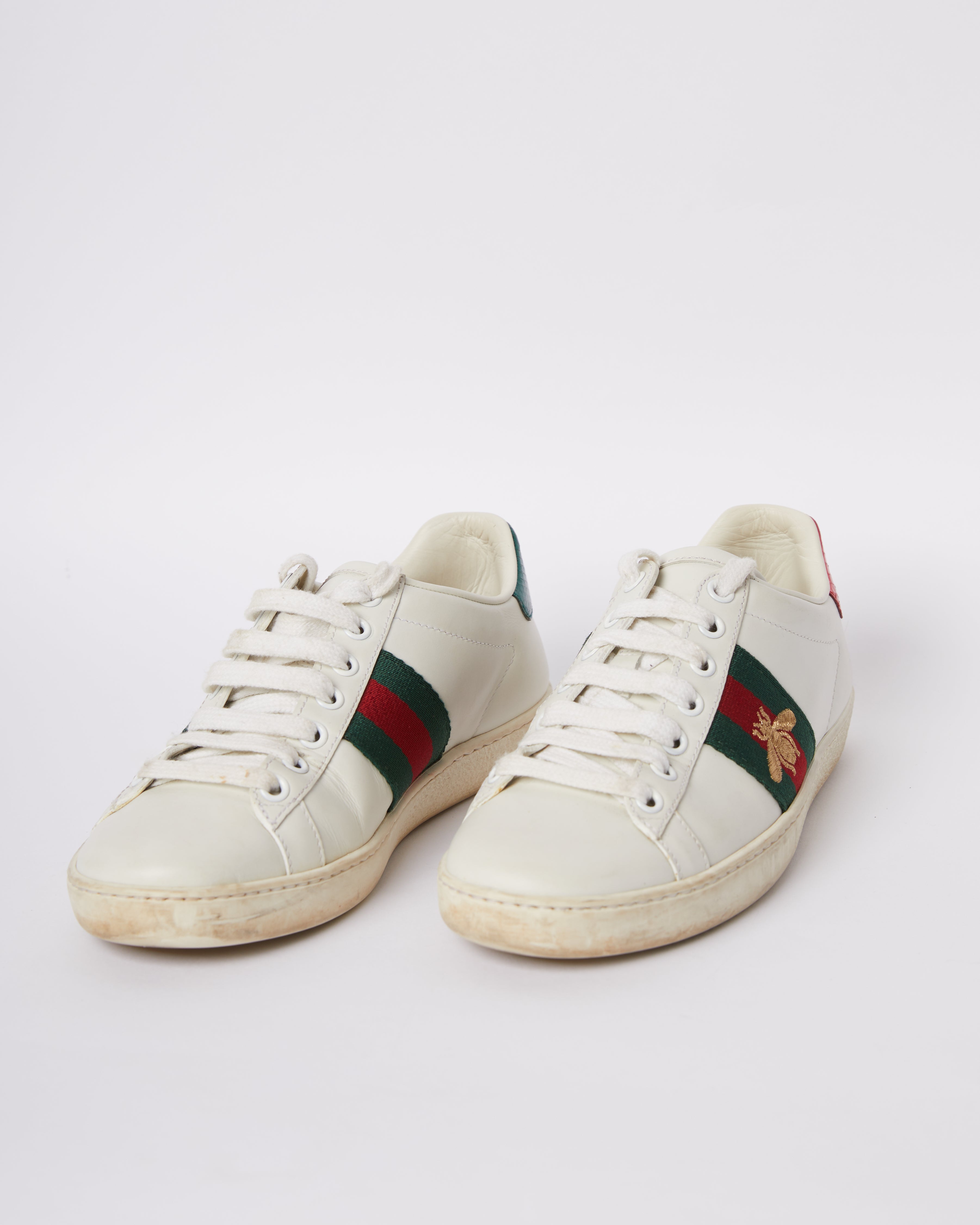 Gucci green fashion and red trainers