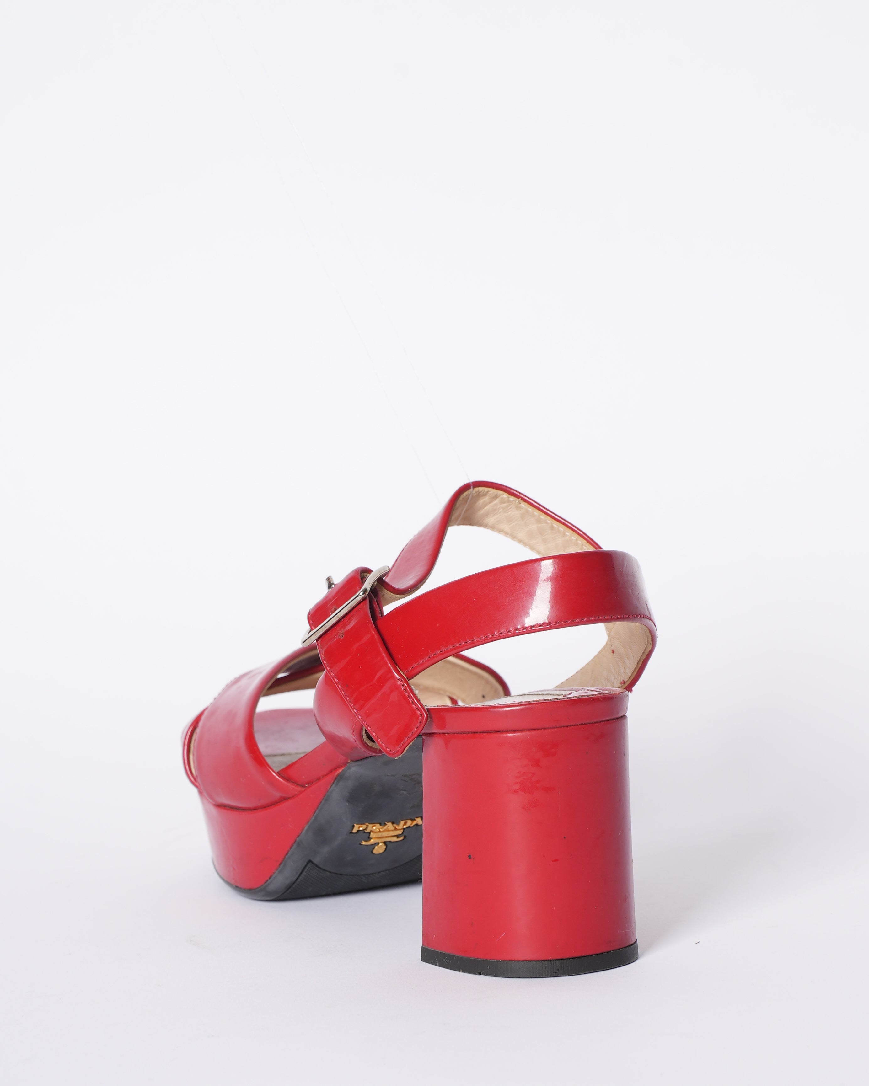 Prada Cross Strap Block Heels In Red Patent Leather