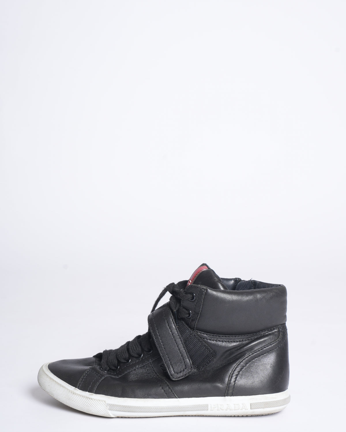 Prada high top black leather sneakers