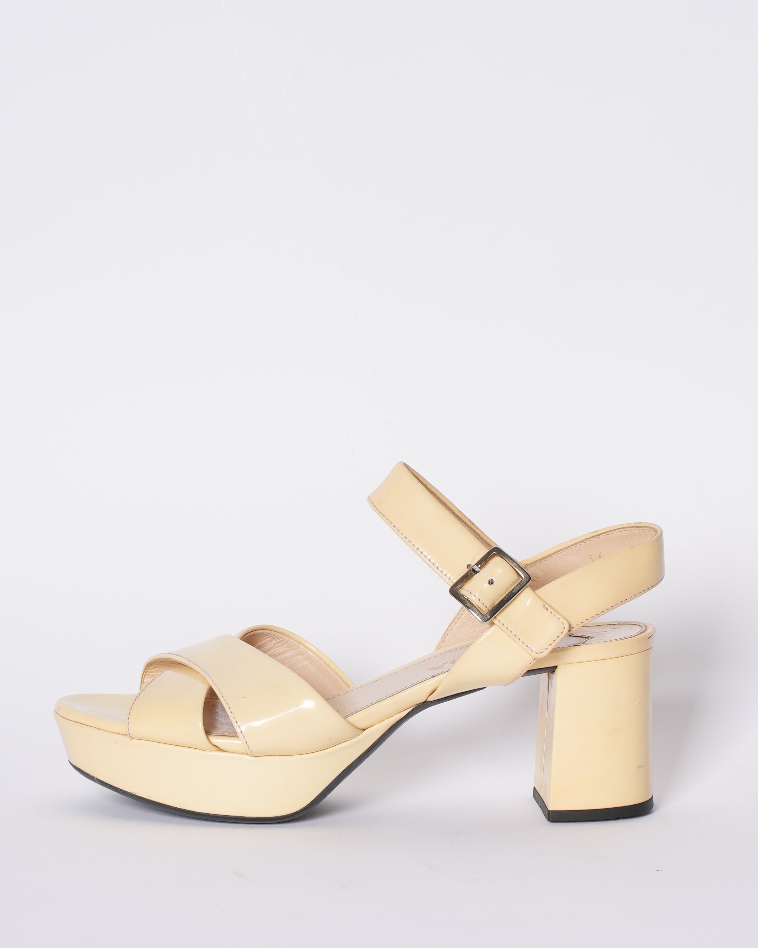 Prada Cross Strap Block Heels In Off-white Patent Leather