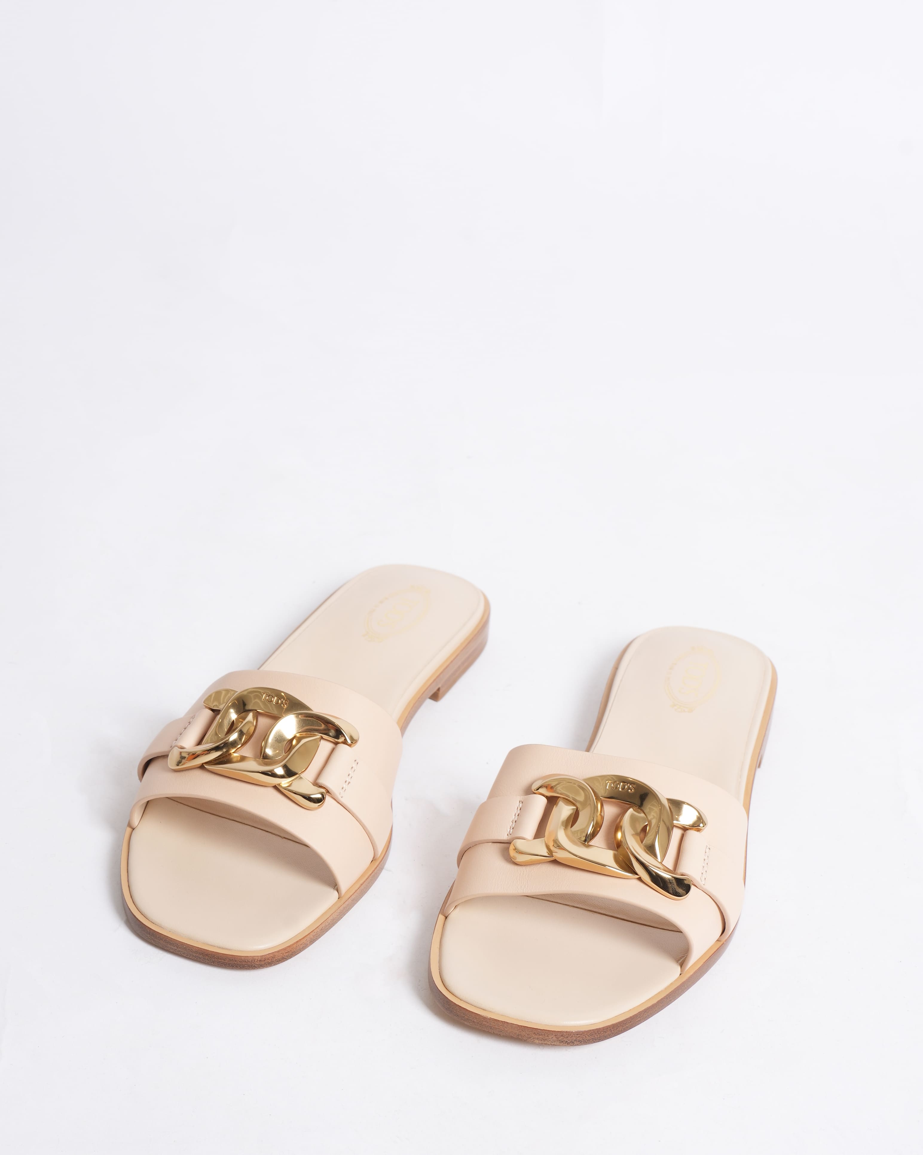 New Tod's Leather mules in off-white