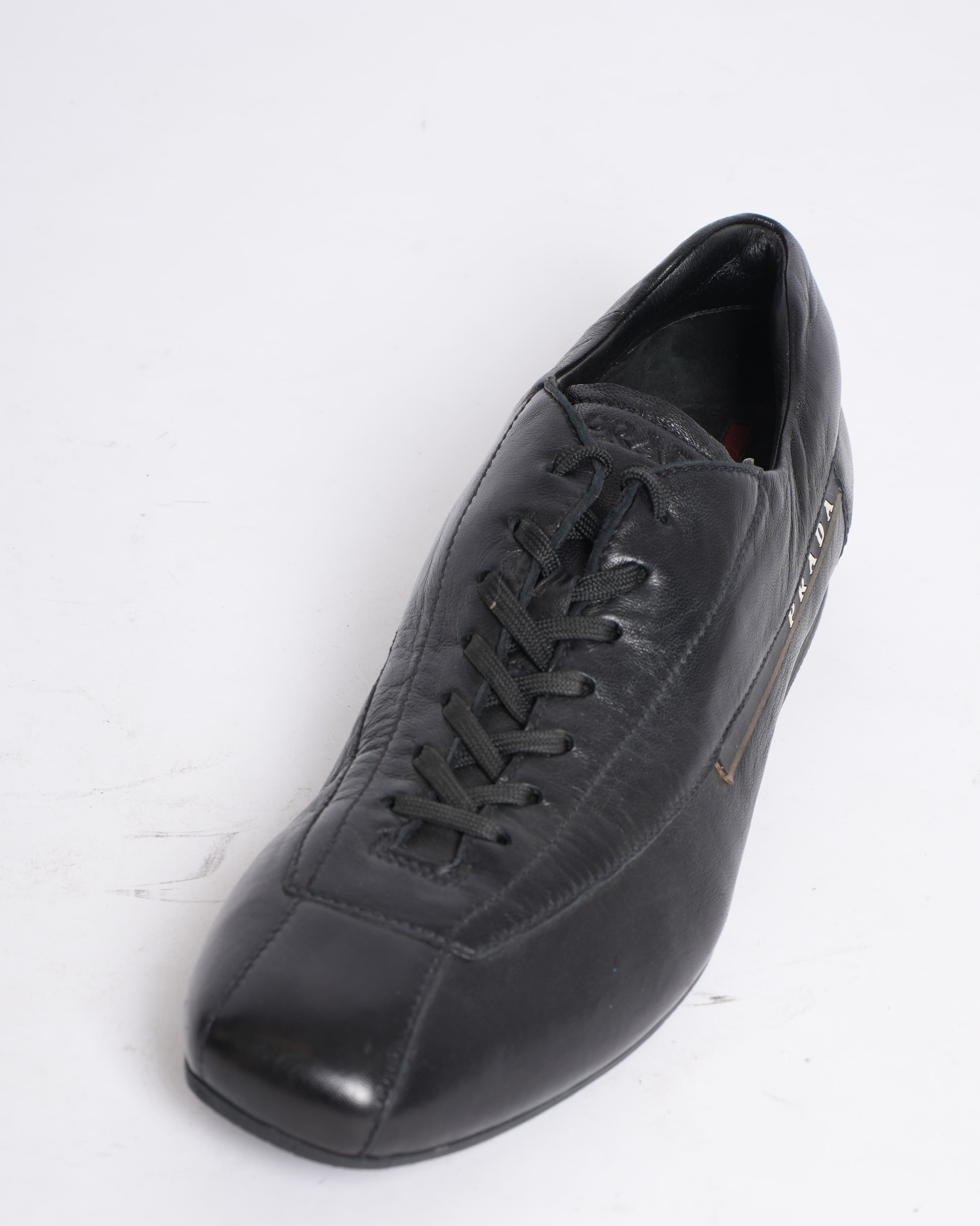 Prada black leather lace-up shoes