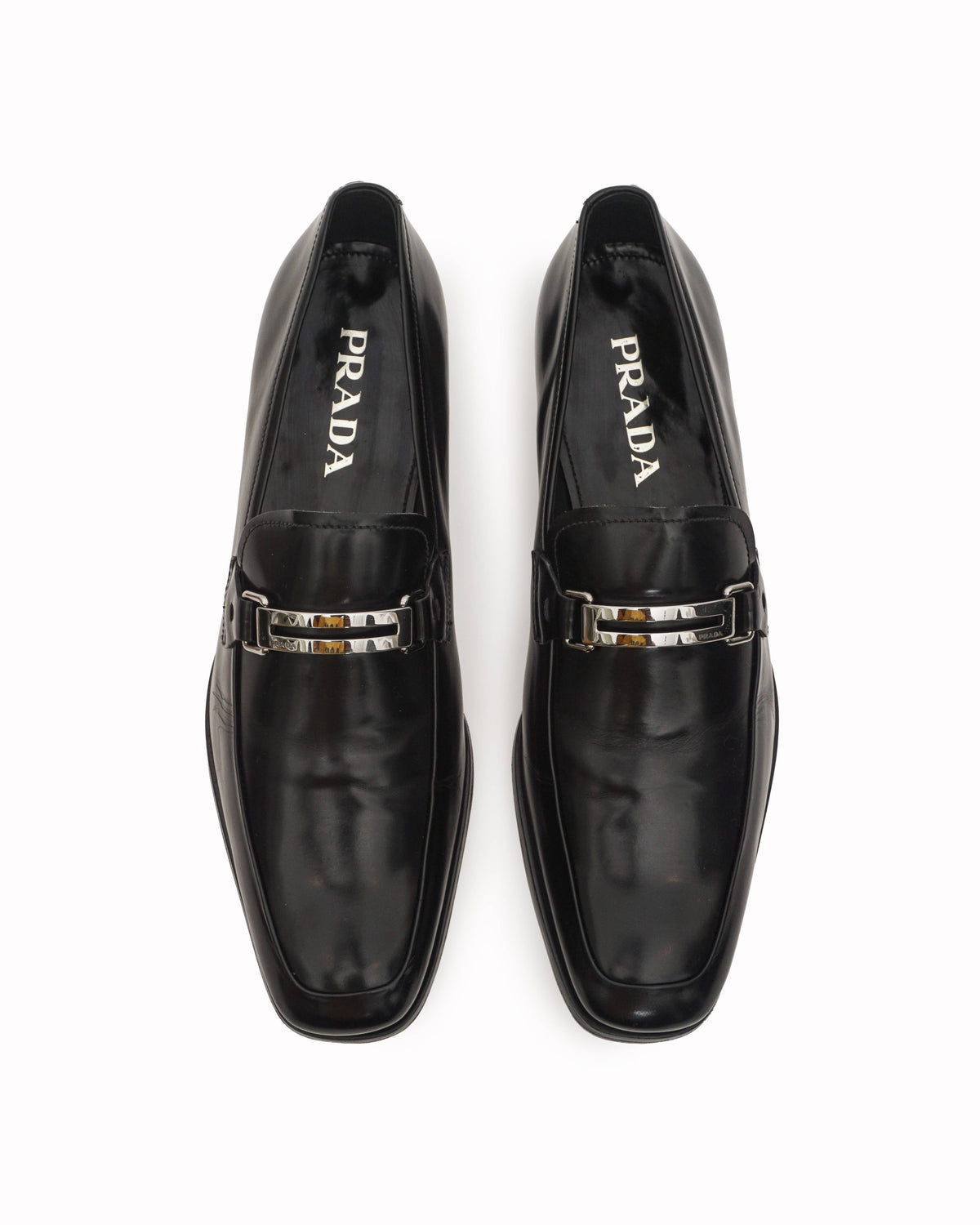 Prada Men’s Black Leather Silver Bit Loafers