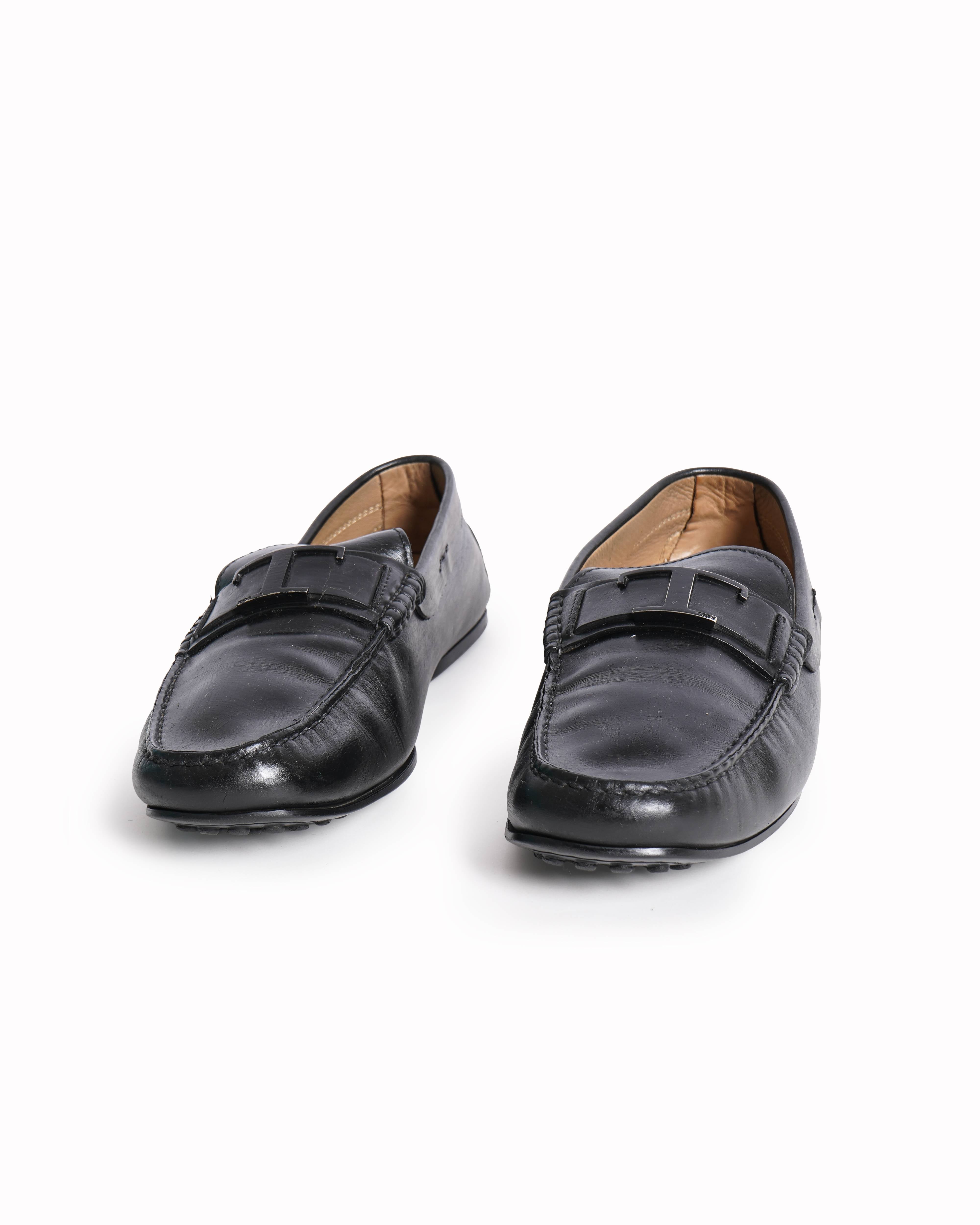 Tod's black leather loafers
