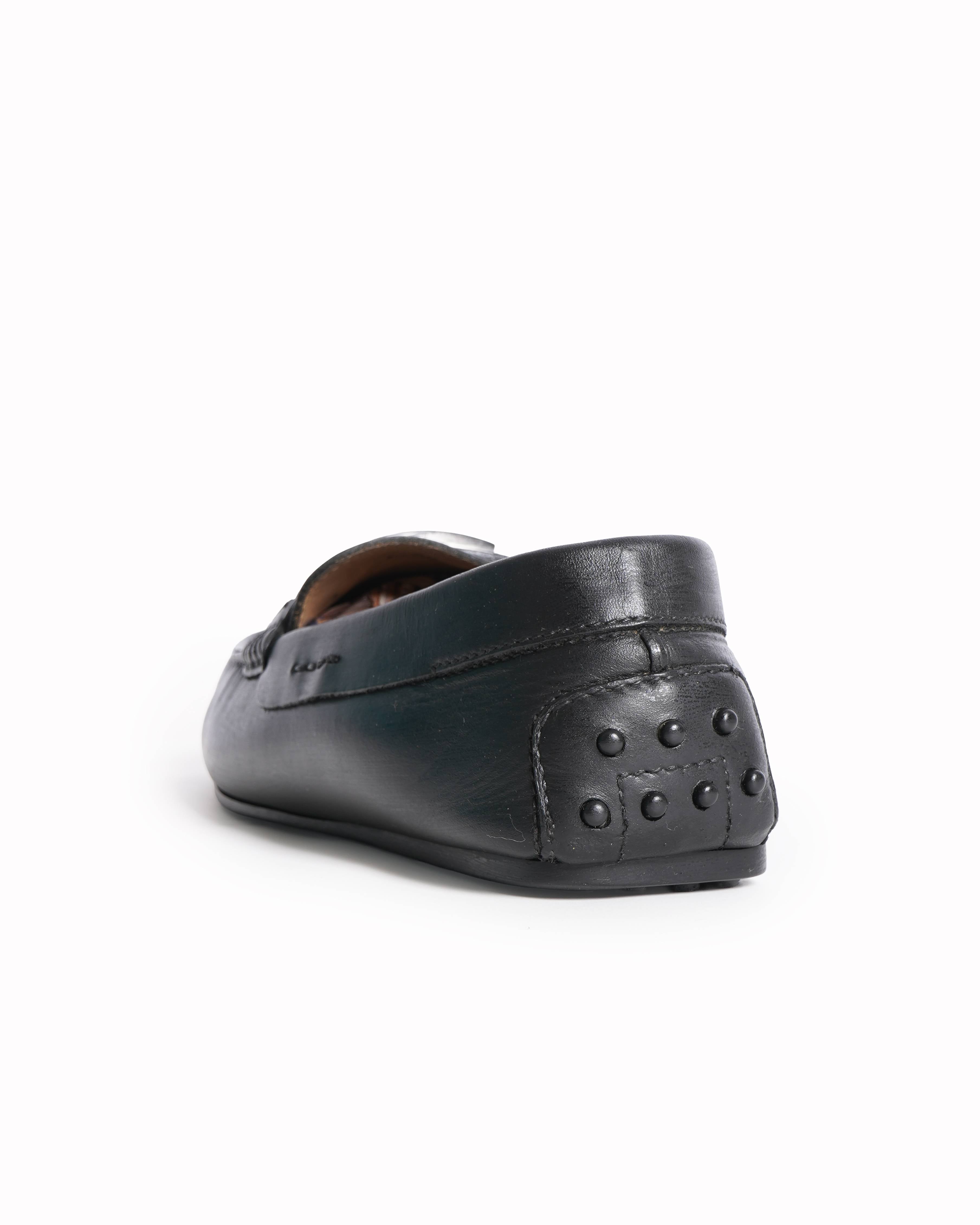 Tod's black leather loafers