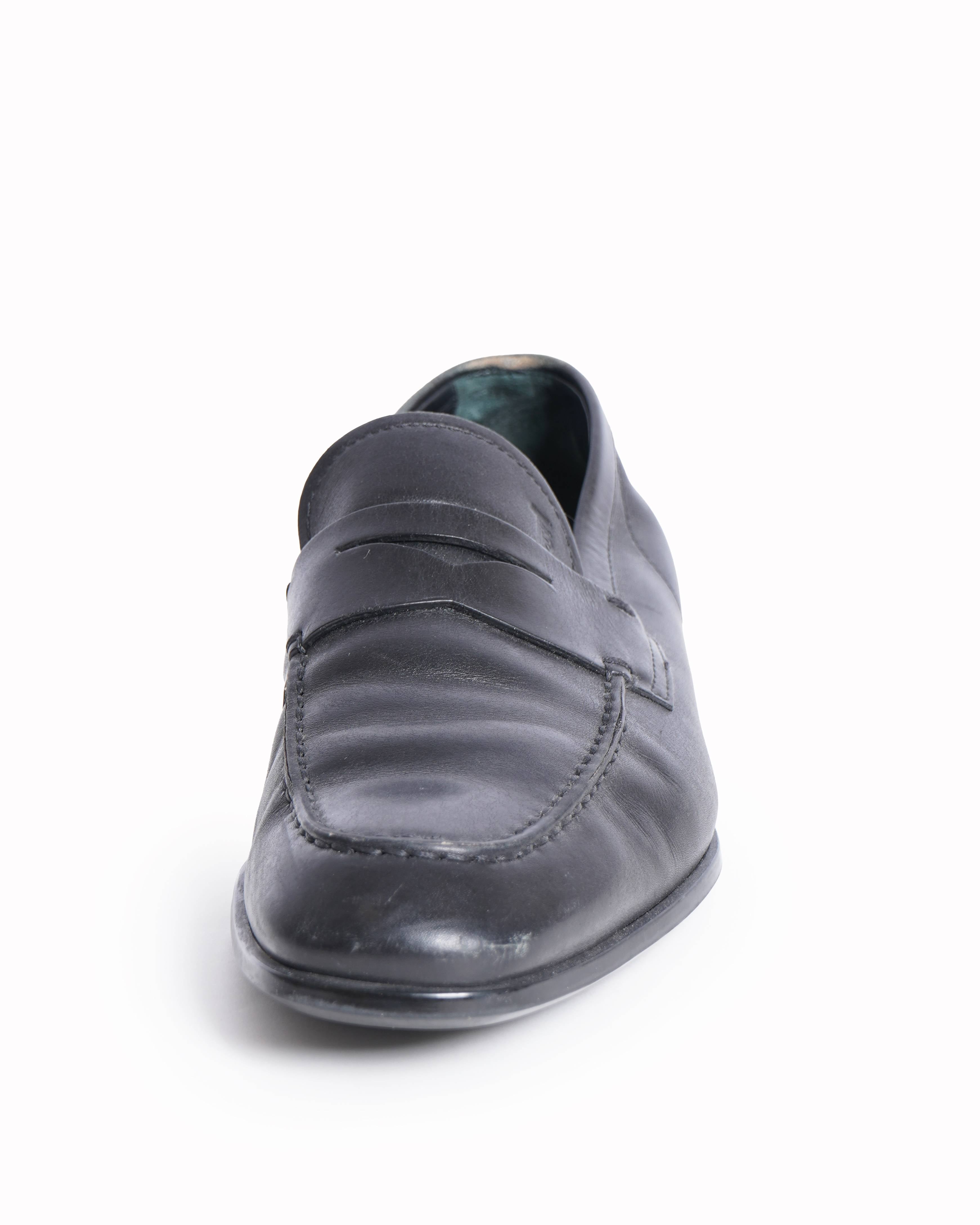 Tod’s black leather gomma leggera moccasins