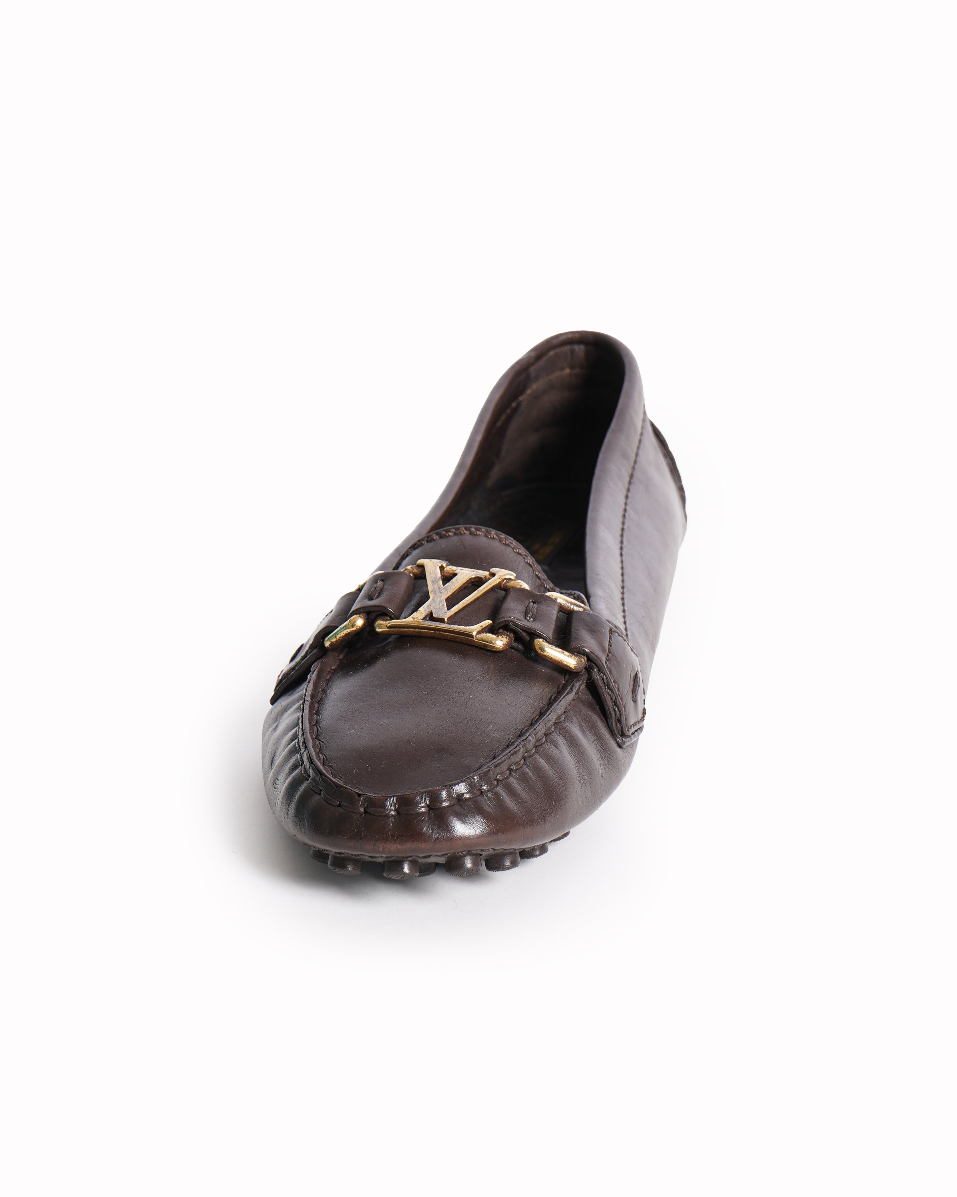 Louis Vuitton brown 
Leather loafers