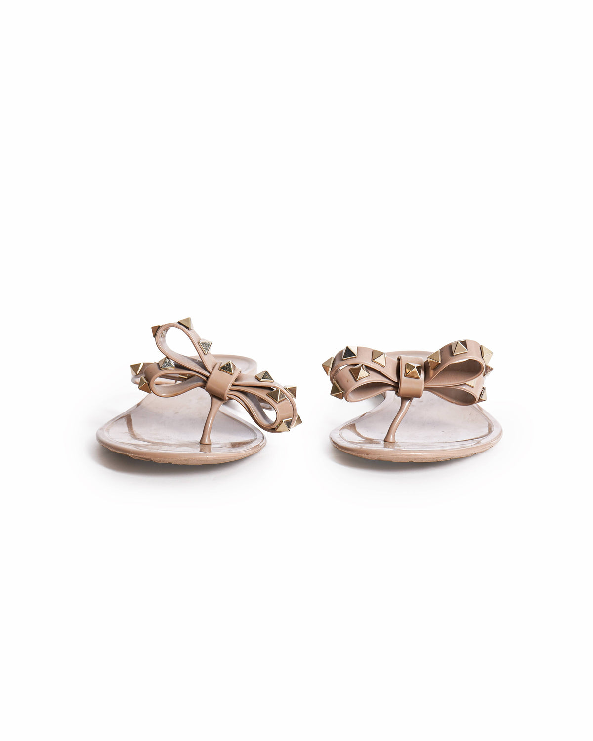 Valentino Garavani Rockstud PVC Flat Thong Sandals In Beige