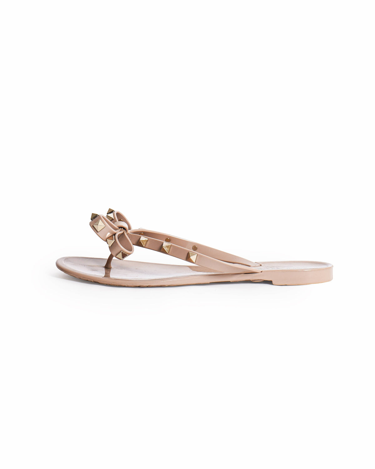Valentino Garavani Rockstud PVC Flat Thong Sandals In Beige