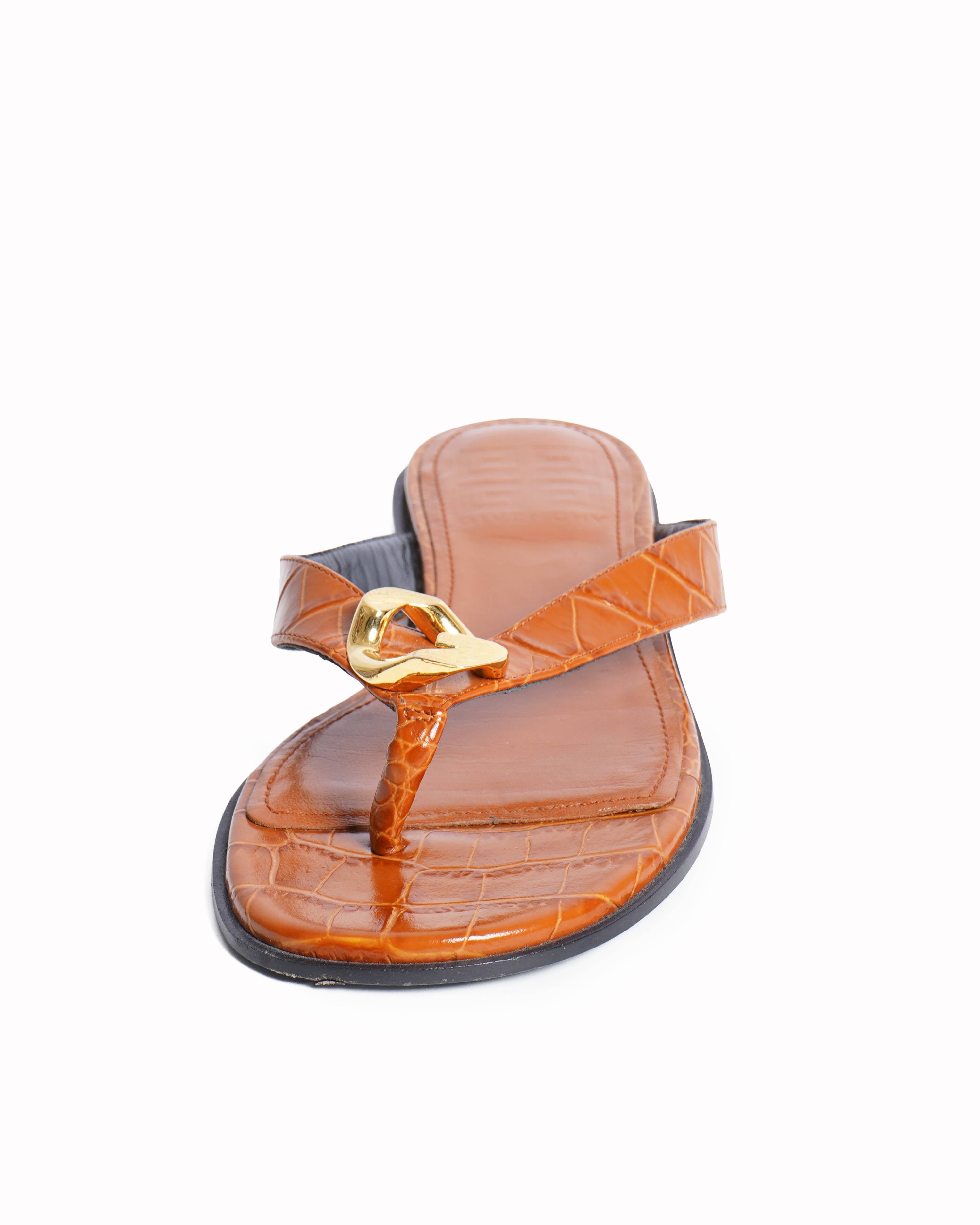 Givenchy 
G chain Buckle sandals in crocodile embossed leather