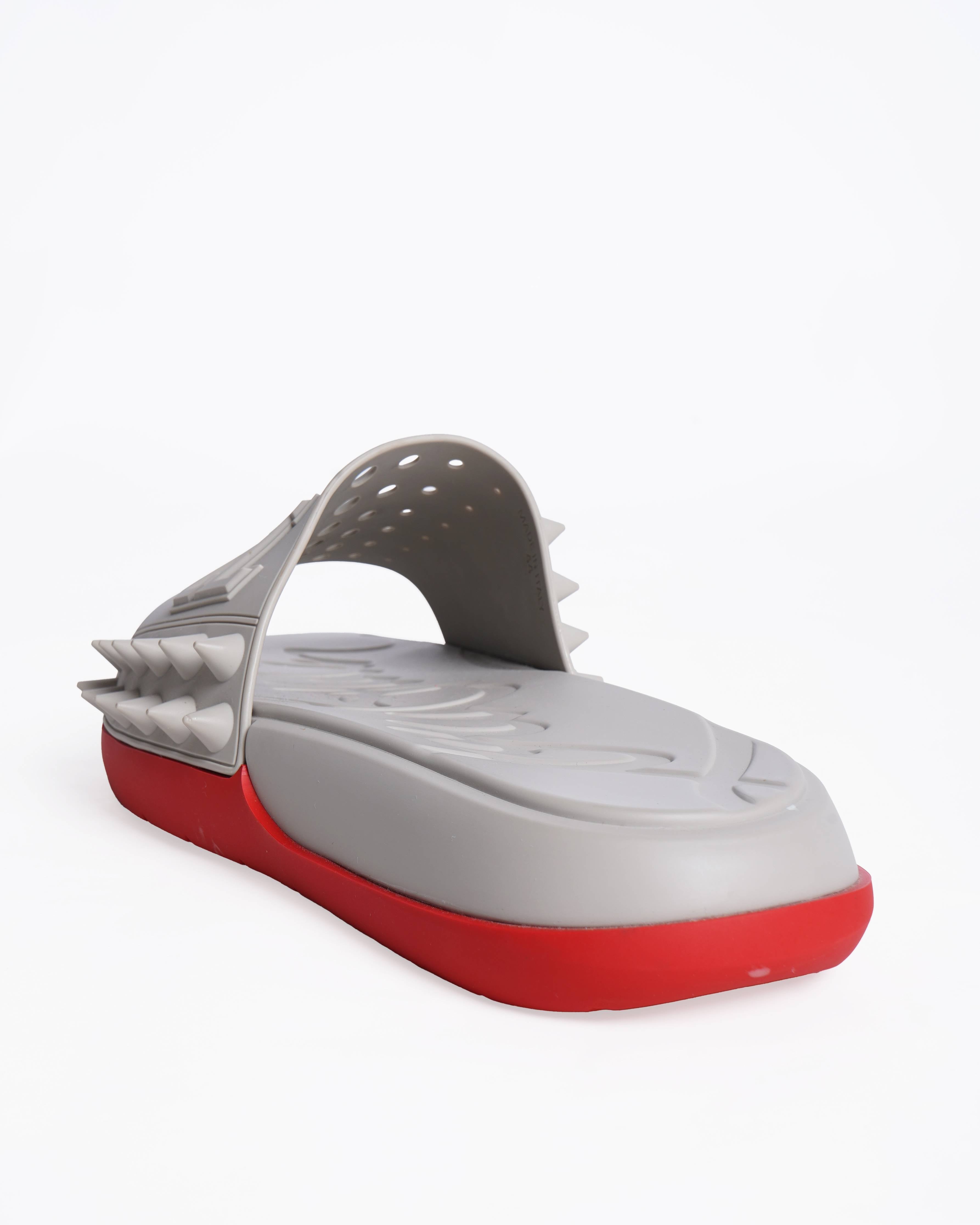 New Christian Louboutin
Take It Easy perforated spiked slides