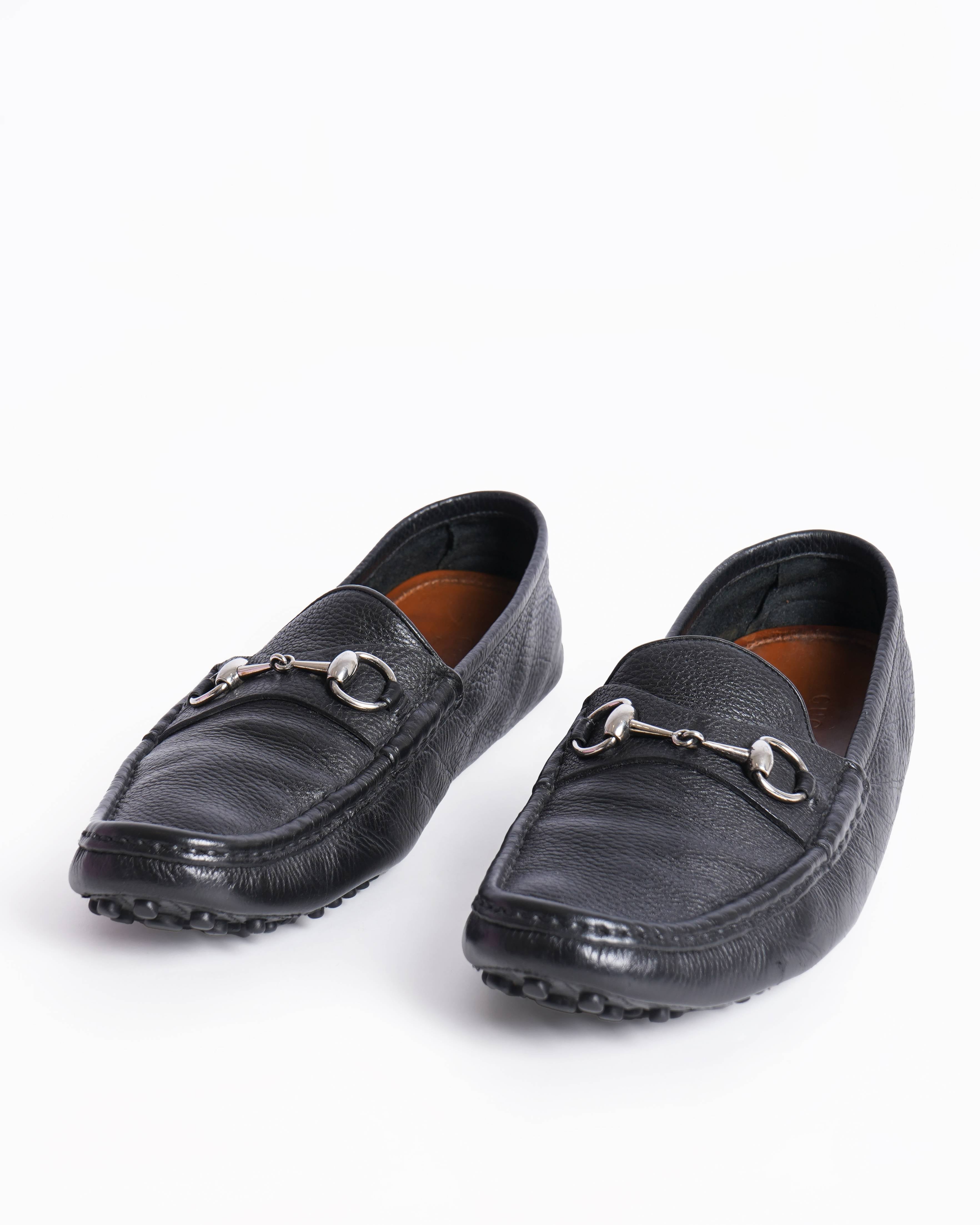 Gucci Men's Drivers Loafers In Black WIth Metal Detailing On Toe Box