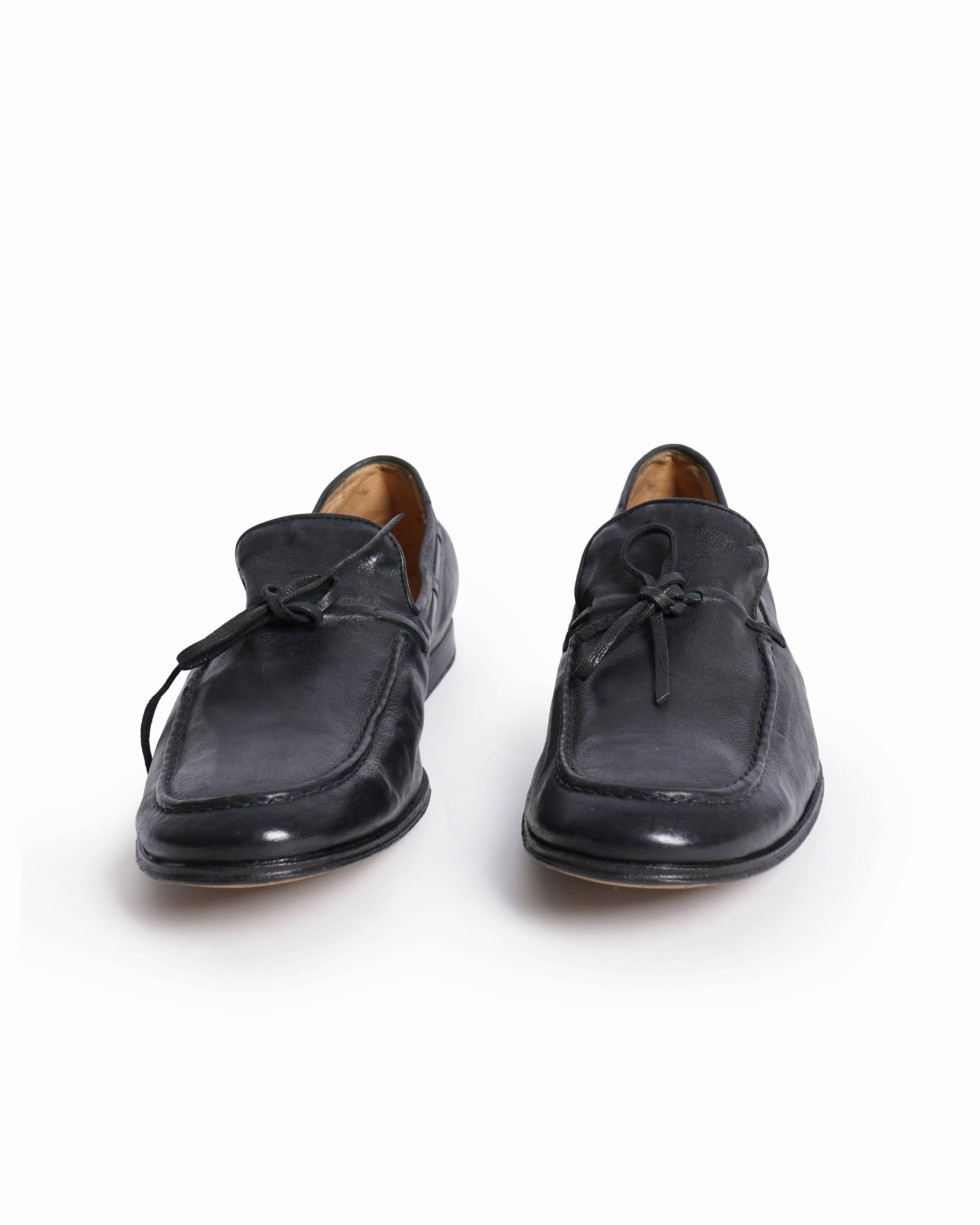 Tod's leather black loafers