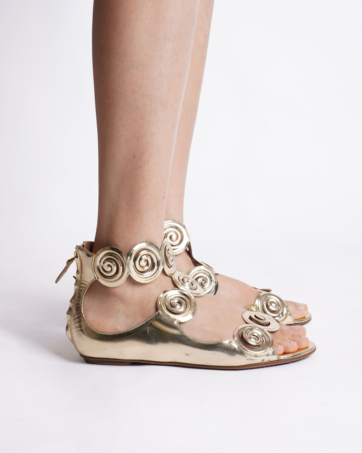 Alaia back zipped rhodium flat sandals