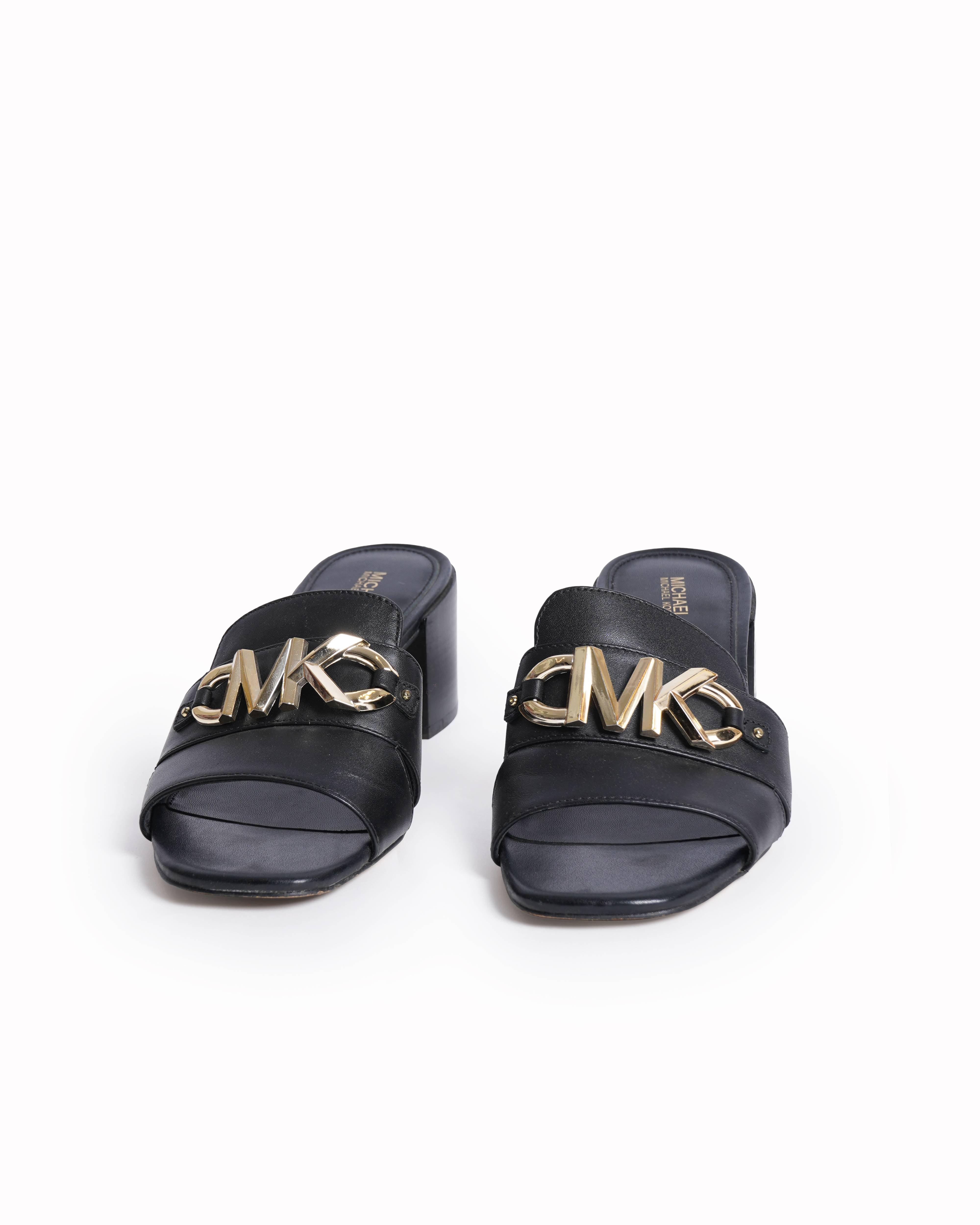 Michael Kors 
zzy Logo Mules in Leather