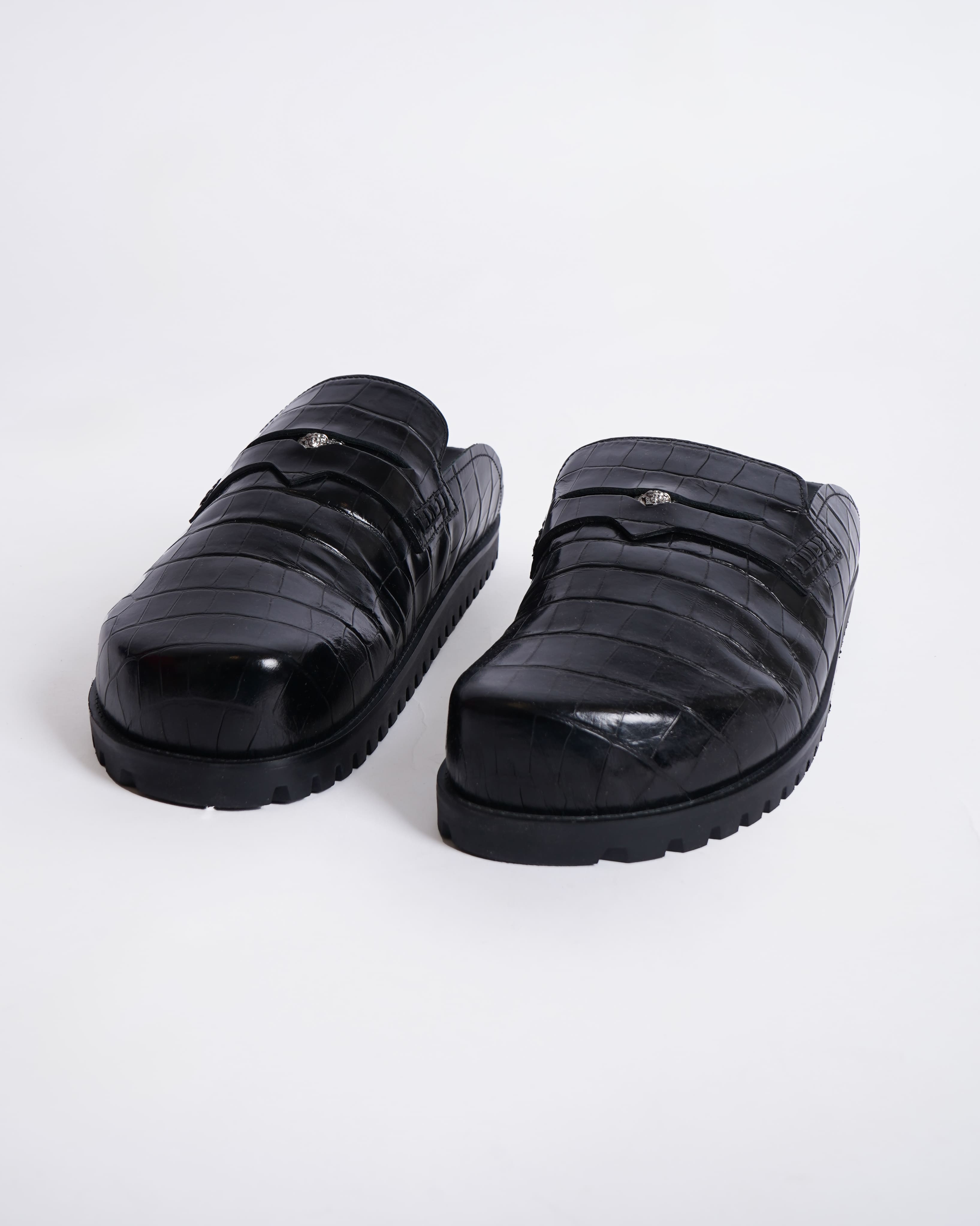 New Versace
Medusa crocodile-embossed slides