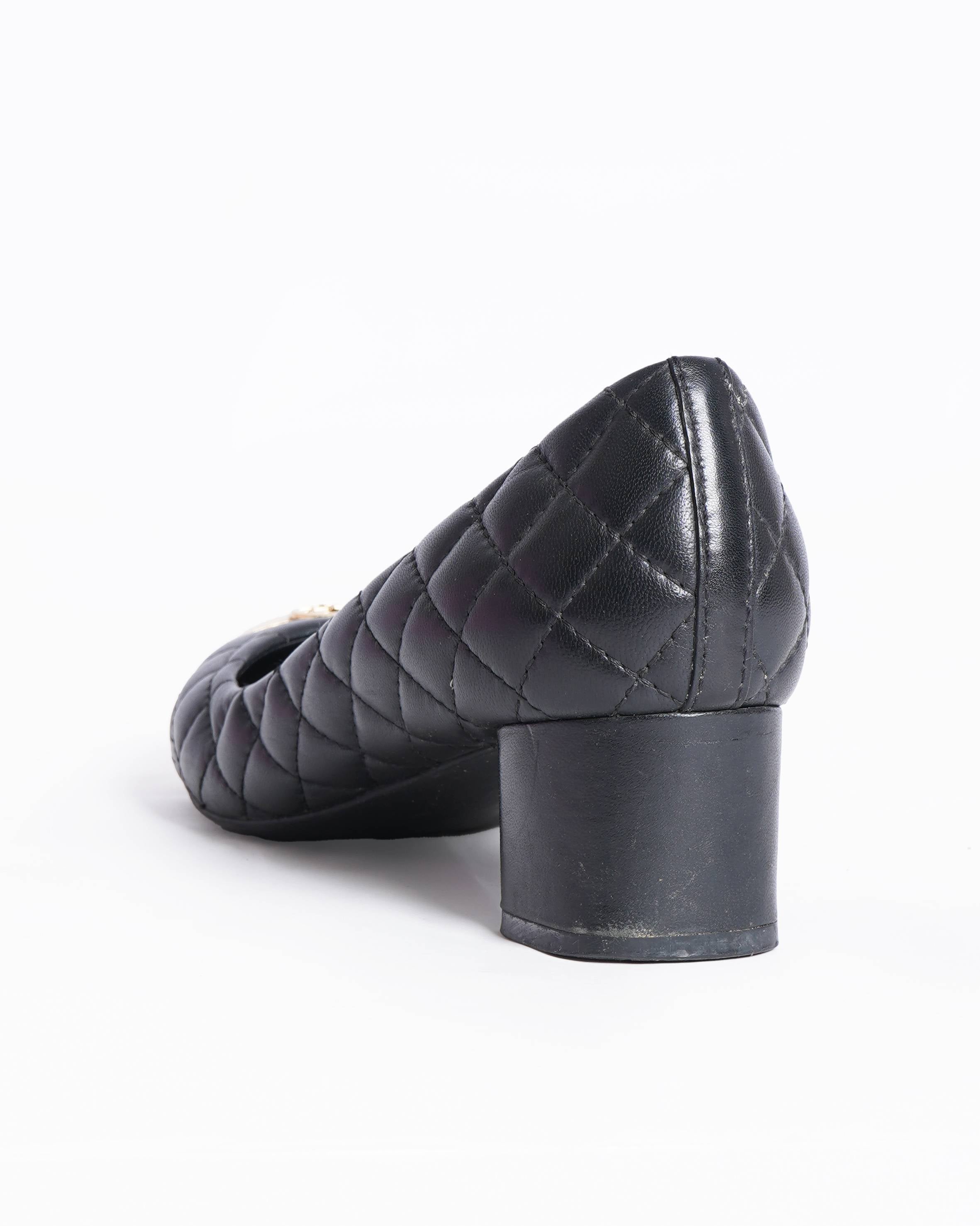 Tory Burch 
Black Leather Ballet Heels