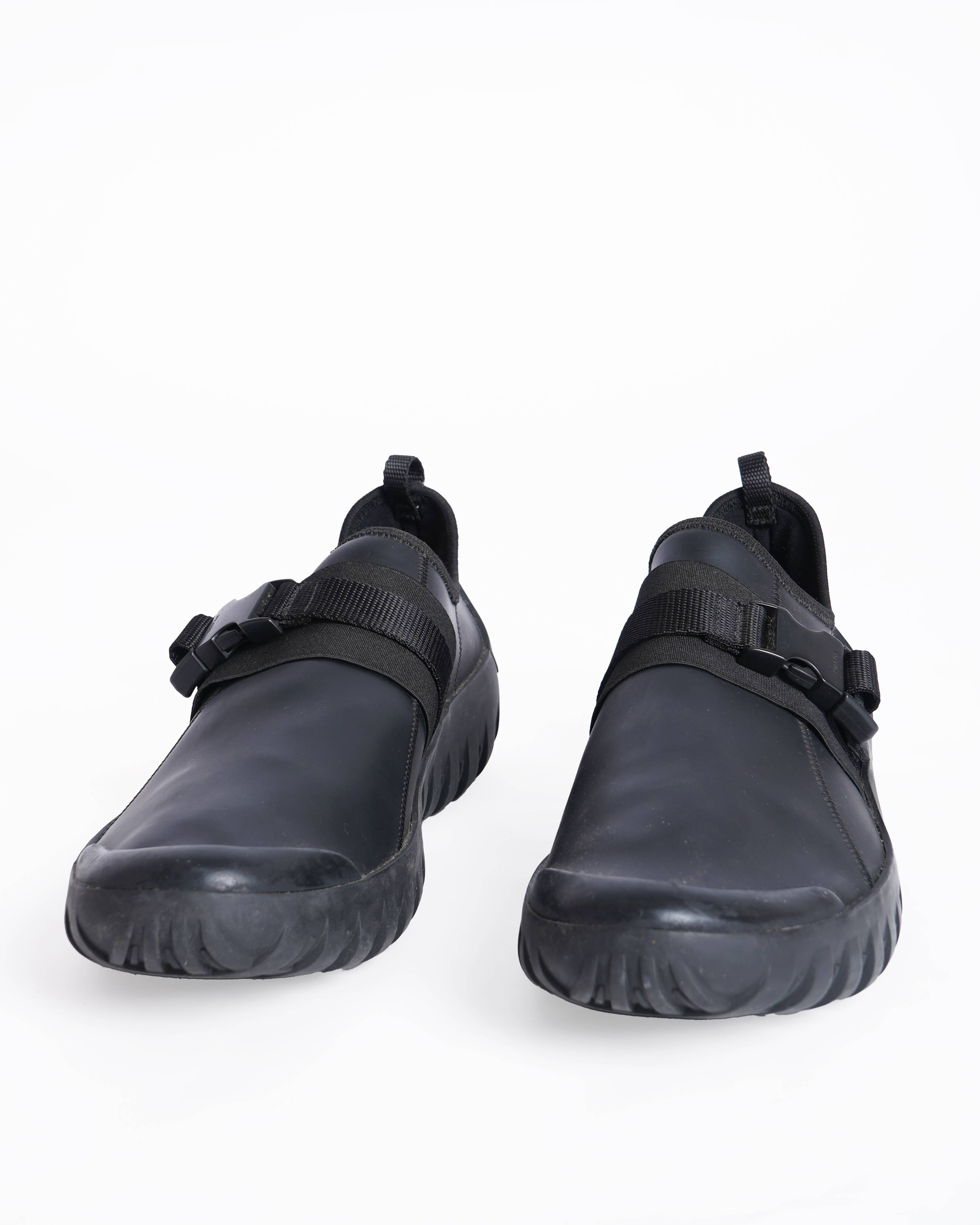 Prada black leather sneakers