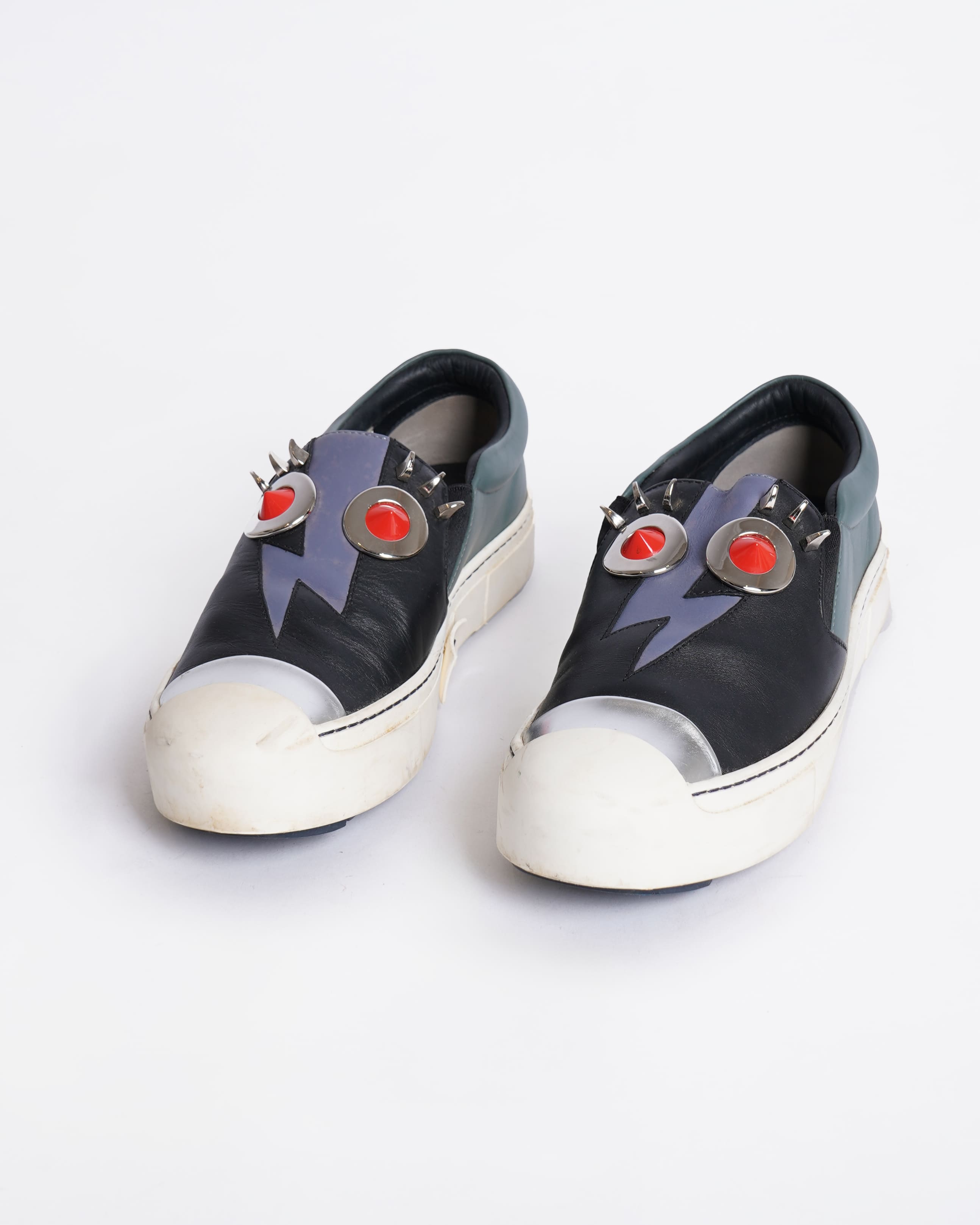 Fendi monster black leather slip on sneakers