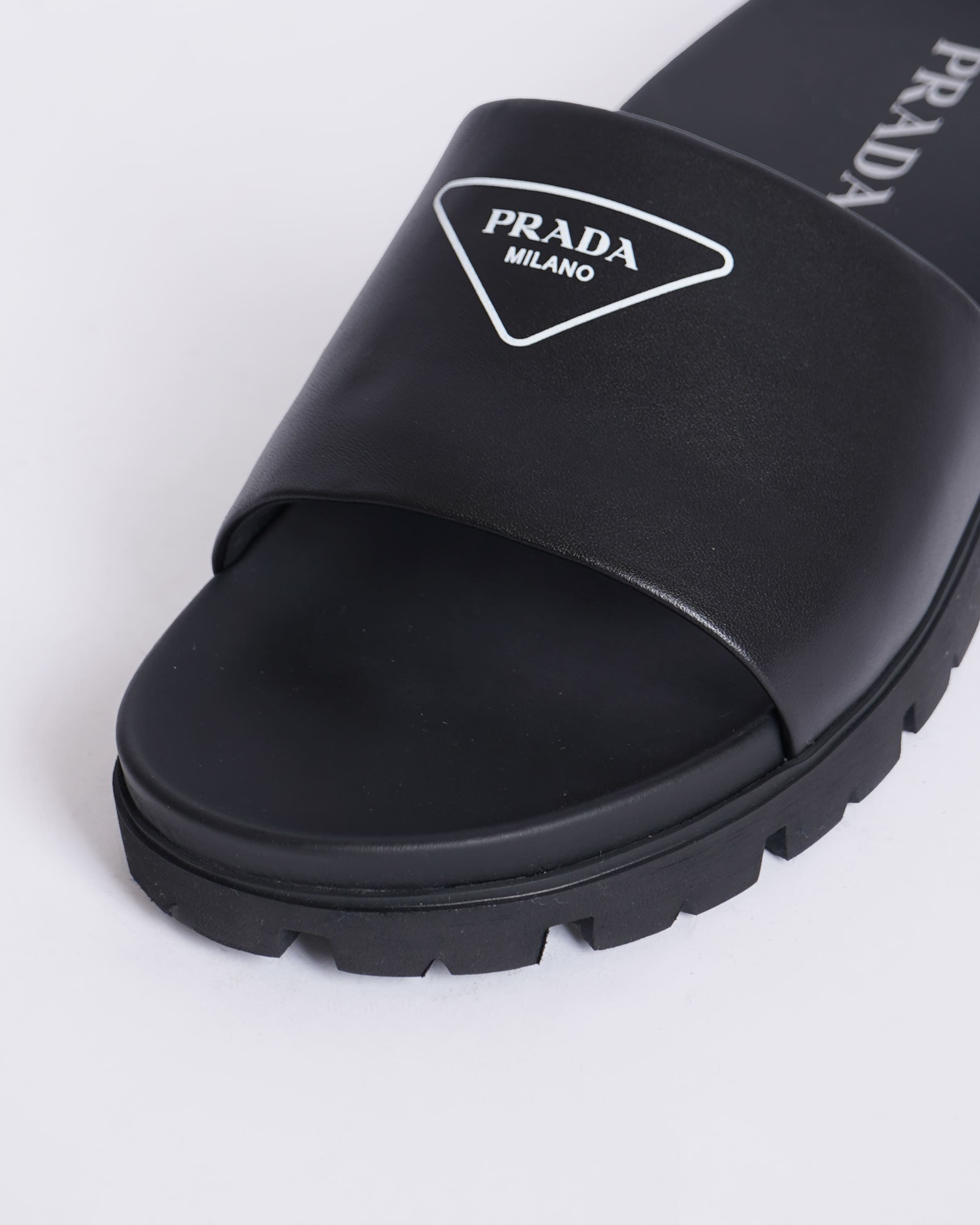 Prada Men's slides sandals in Black