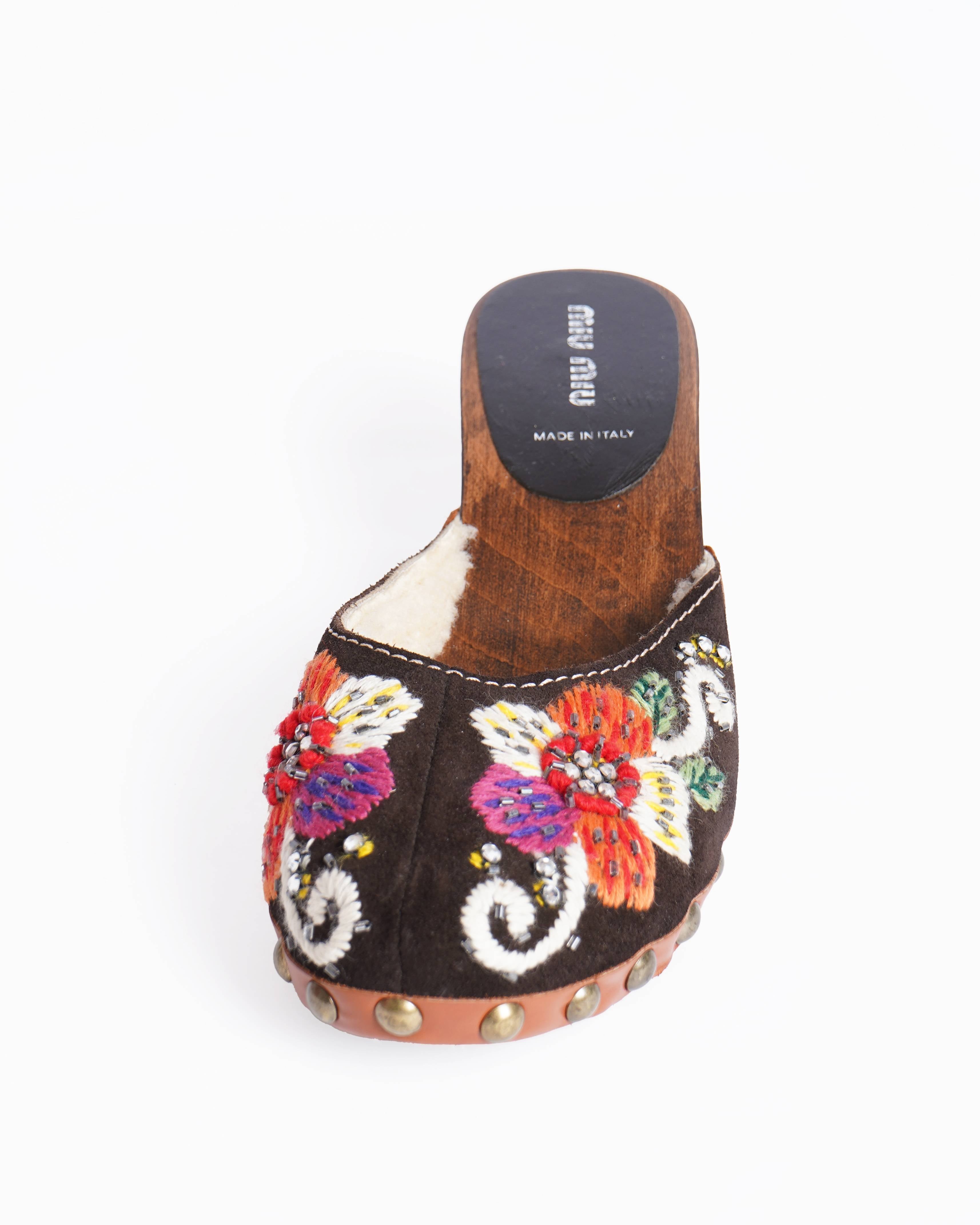 Miu miu embroidered wooden kitten heel clogs