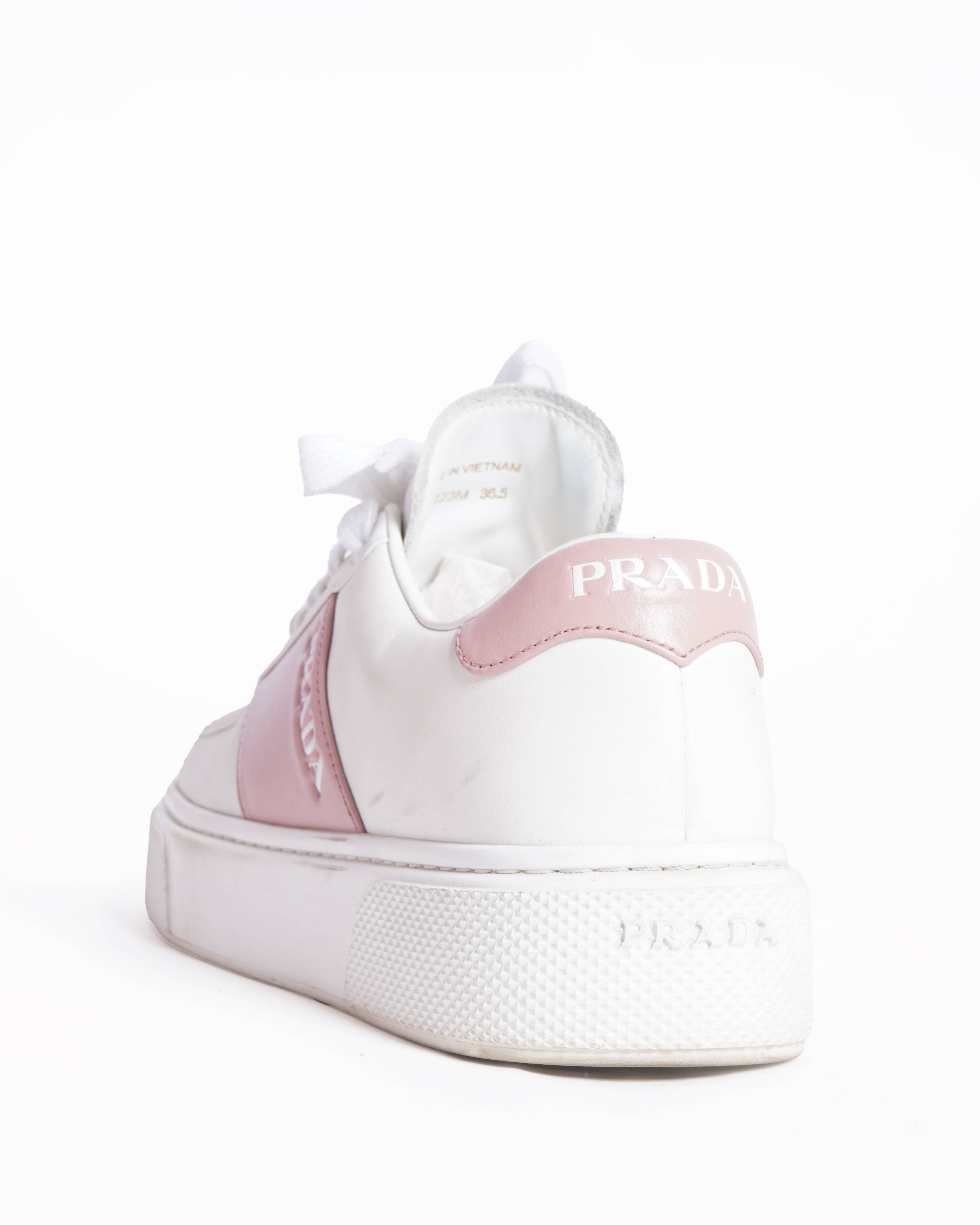 Prada women's pink and white trainers
