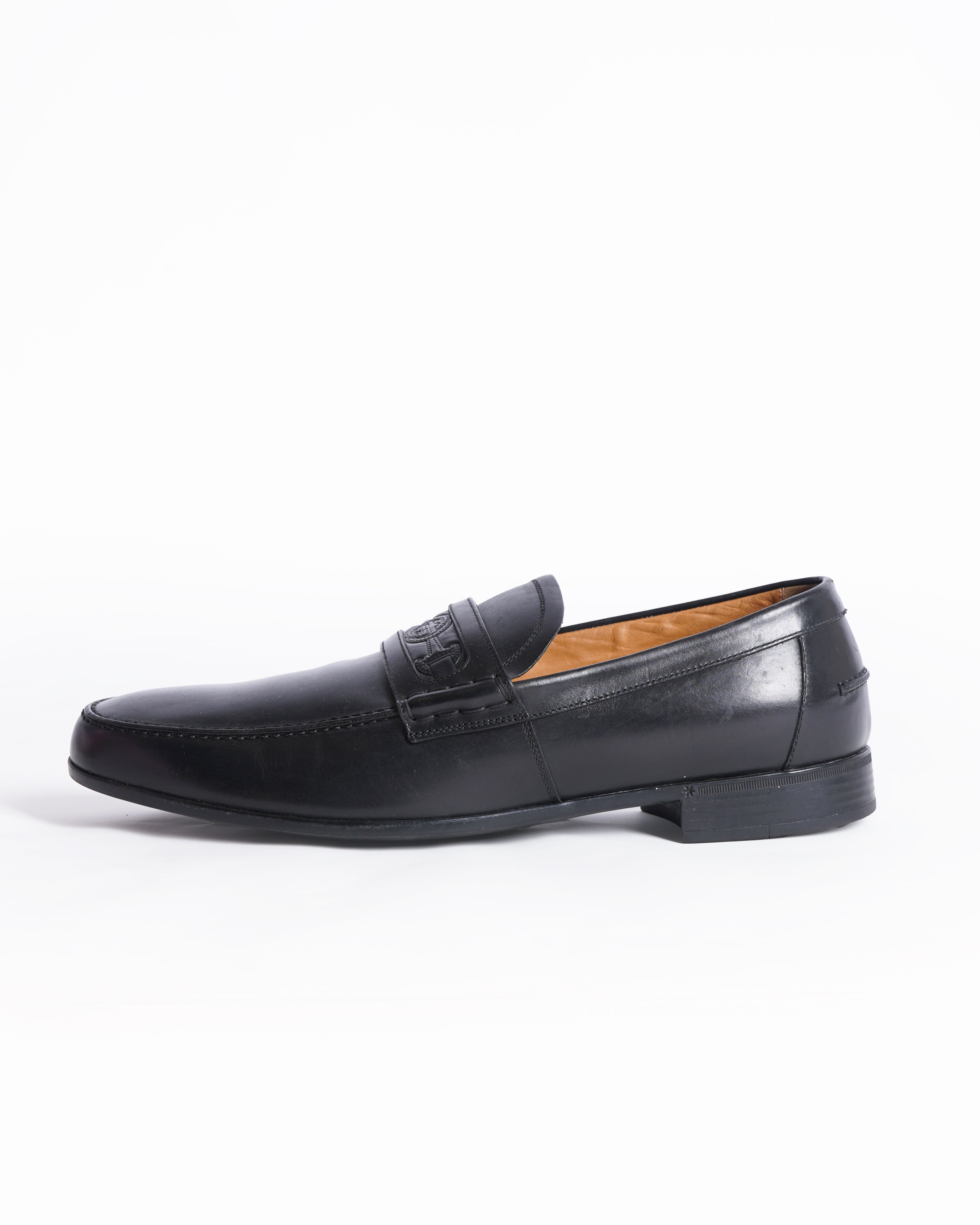 Gucci black leather GG embossed loafers
