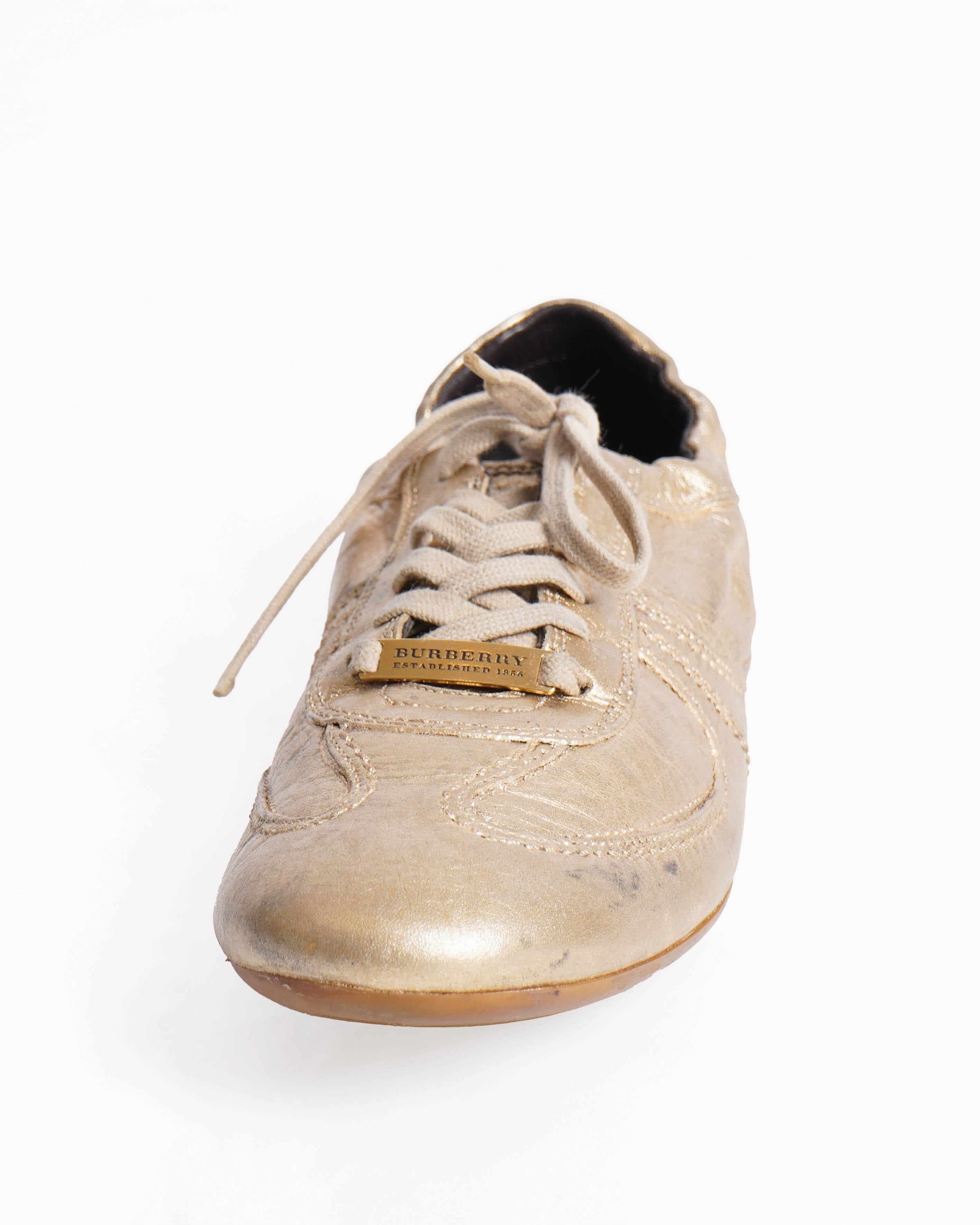 Burberry leather sneakers in a metallic gold finish