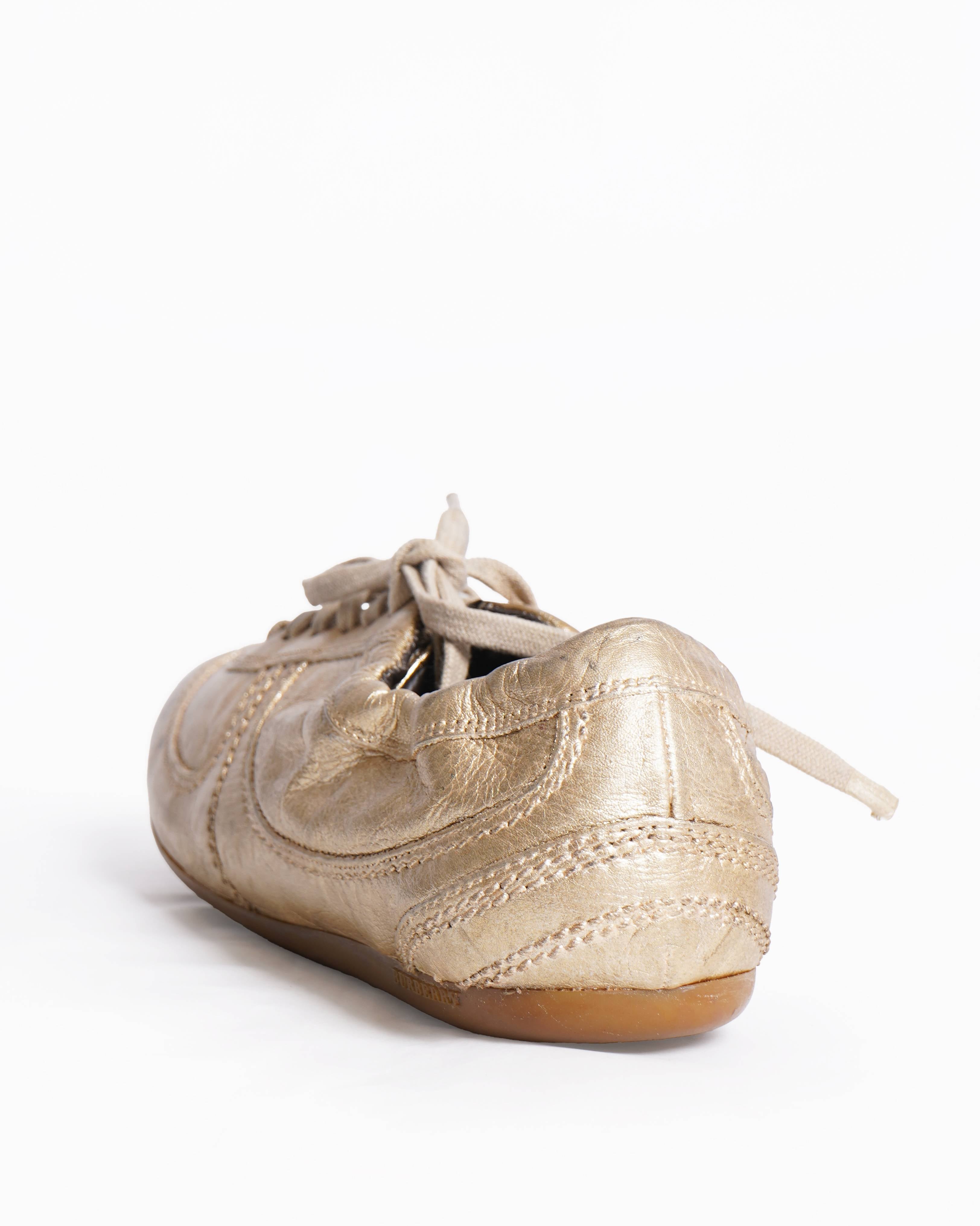 Burberry leather sneakers in a metallic gold finish