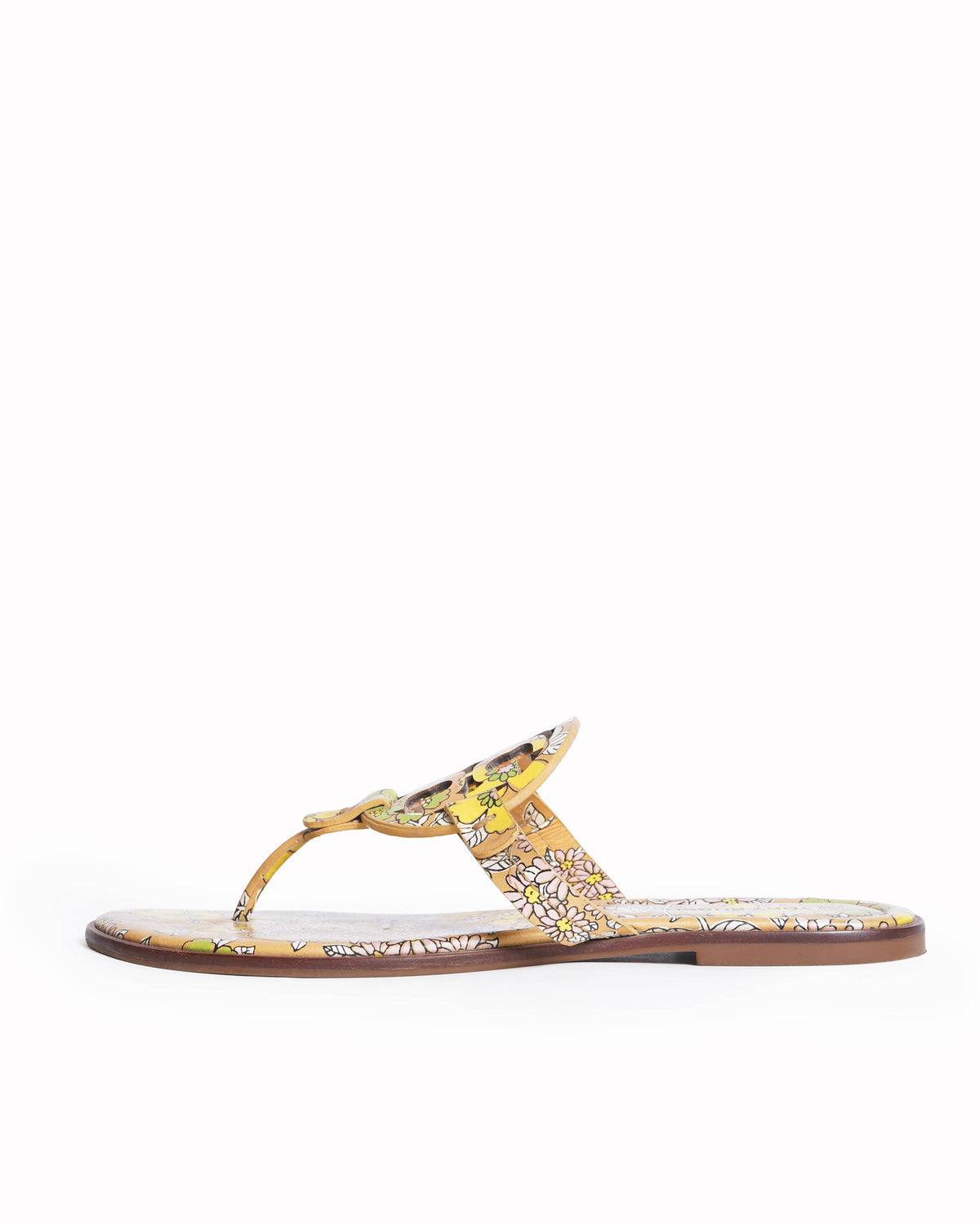 Tory burch 
Beige printed leather flat sandals