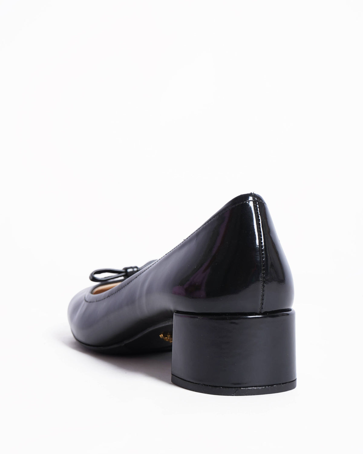 Prada black patent pumps