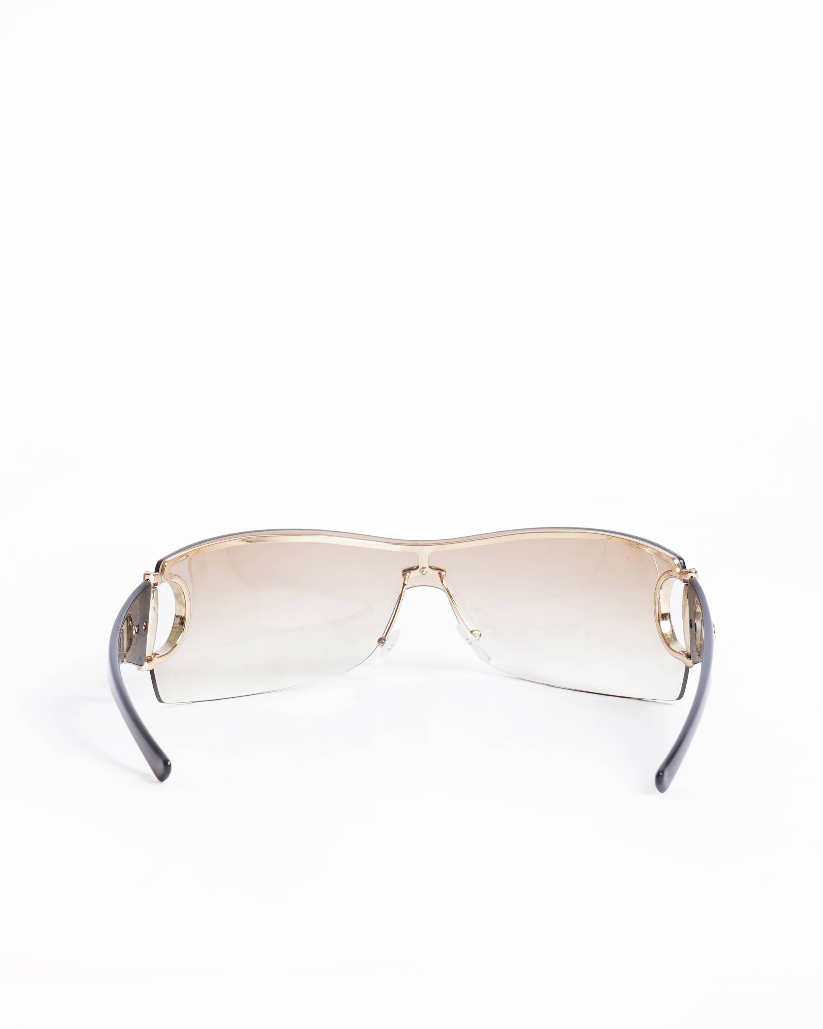 Gucci Rimless Sunglasses in Brown