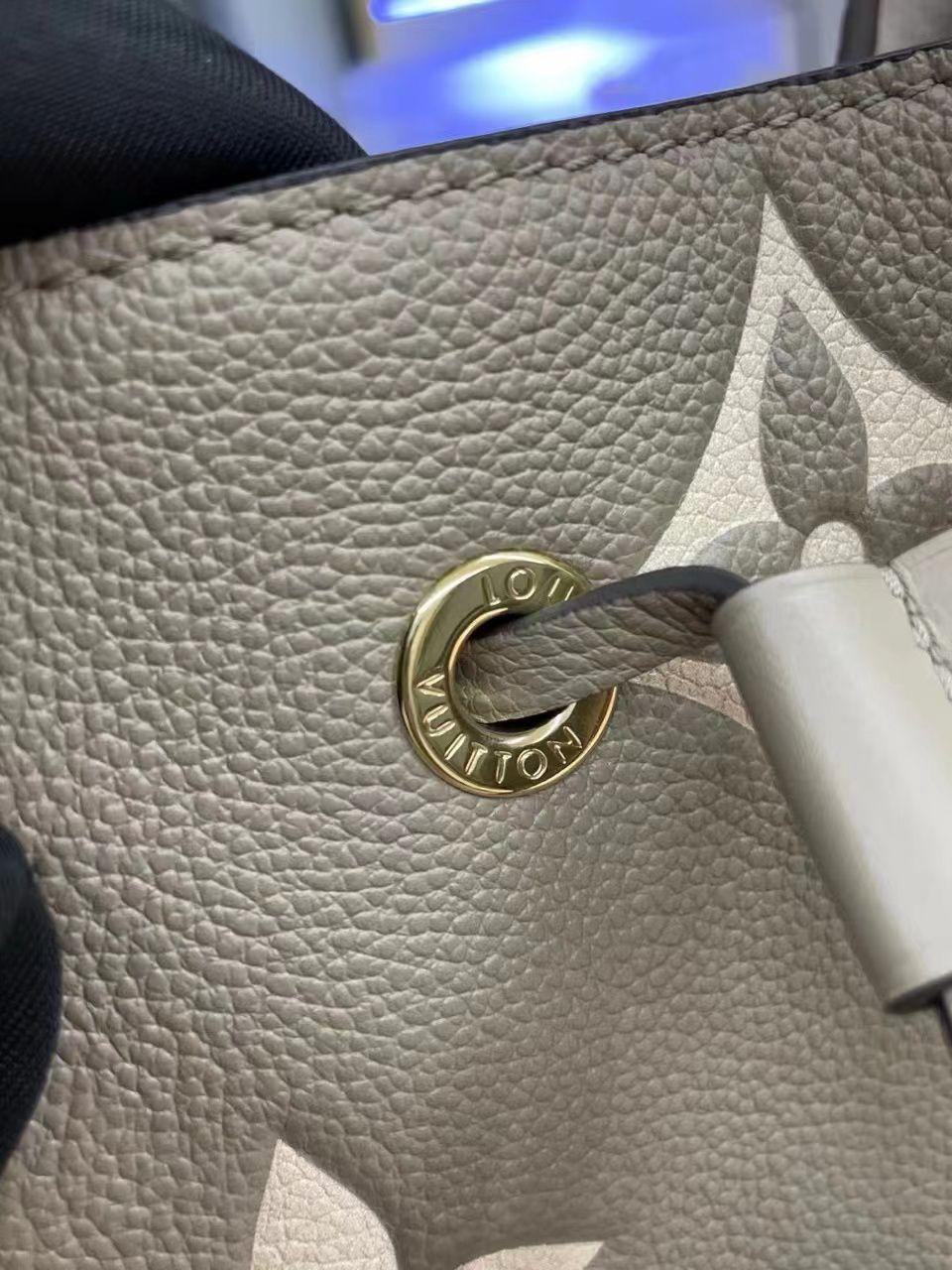 Louis Vuitton Neo Noe MM Bag In Grey