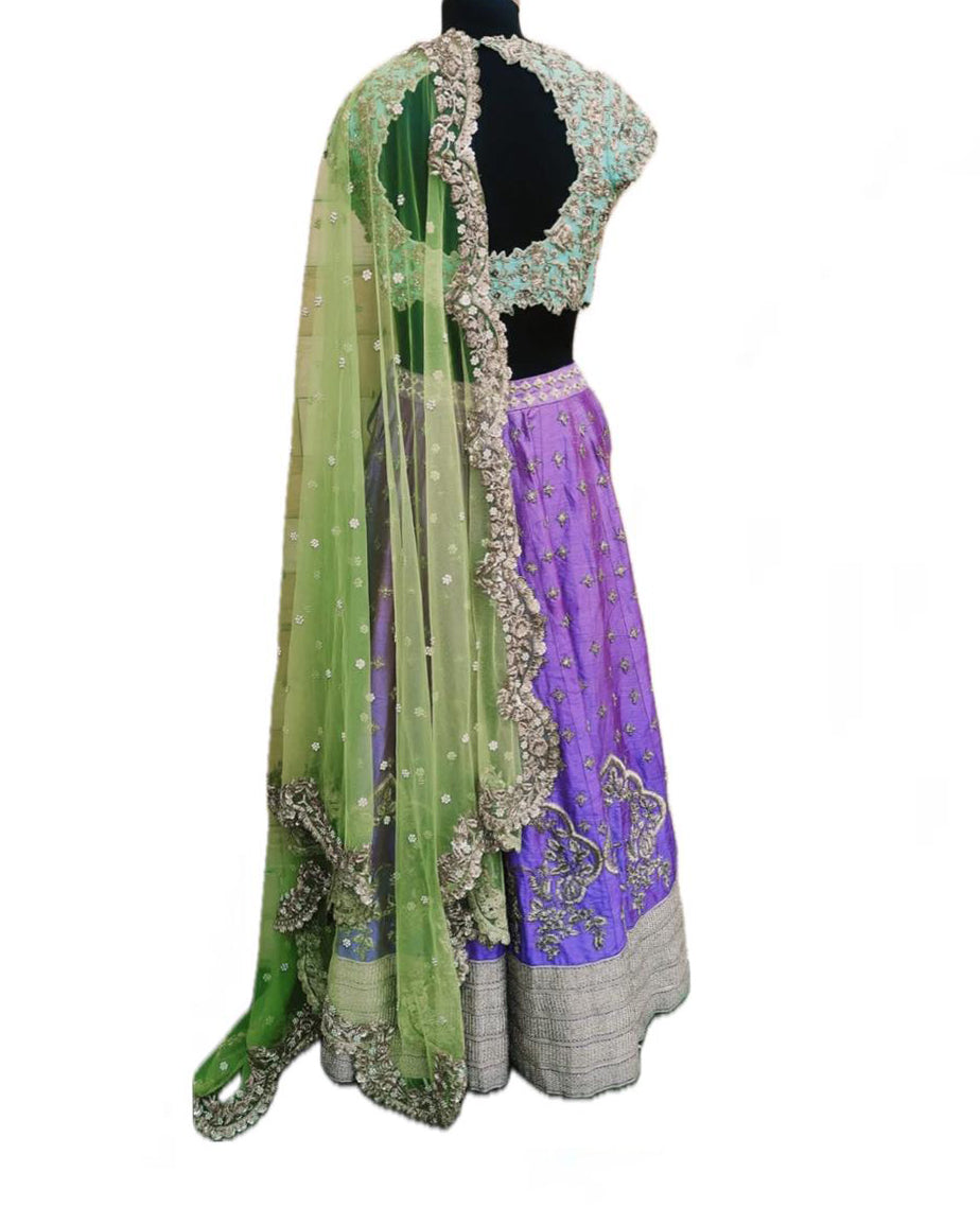 Anushree reddy green and purple embroidered lehenga set