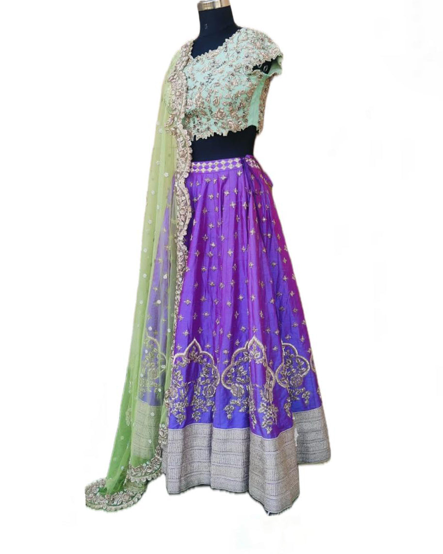 Anushree reddy green and purple embroidered lehenga set