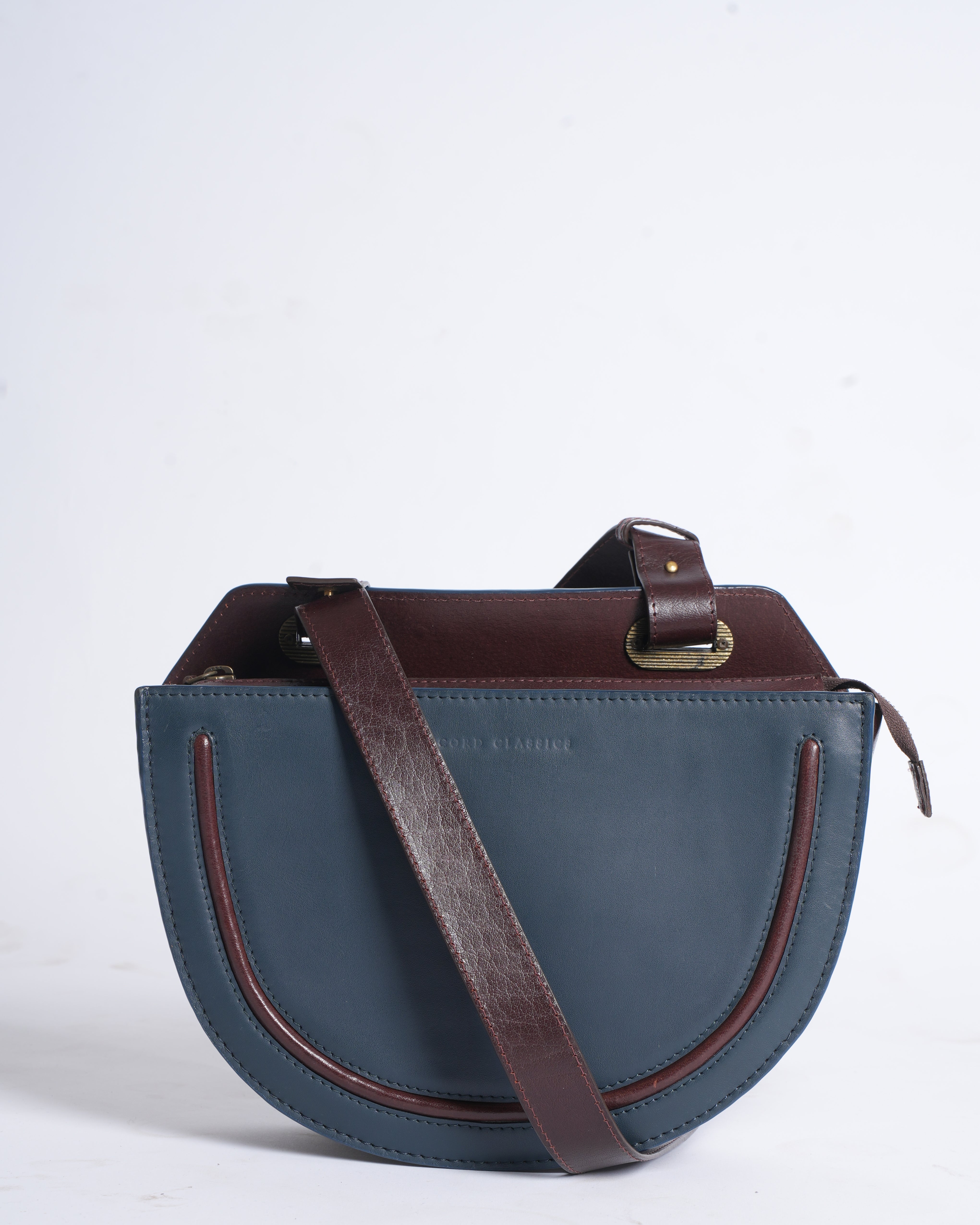 Cord studio sling bag