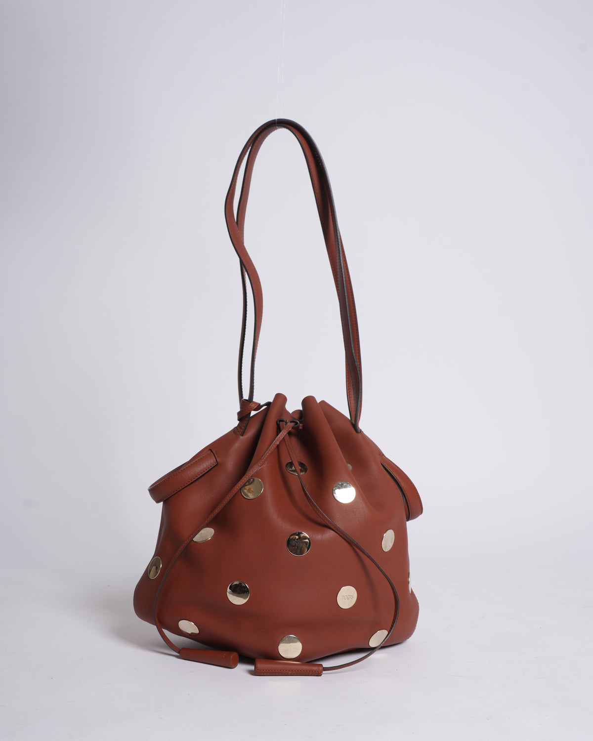 Tod's brown leather metallic stud bucket bag