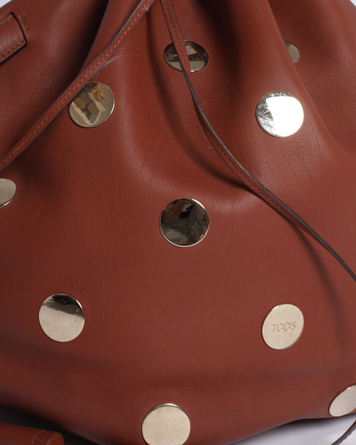 Tod's brown leather metallic stud bucket bag