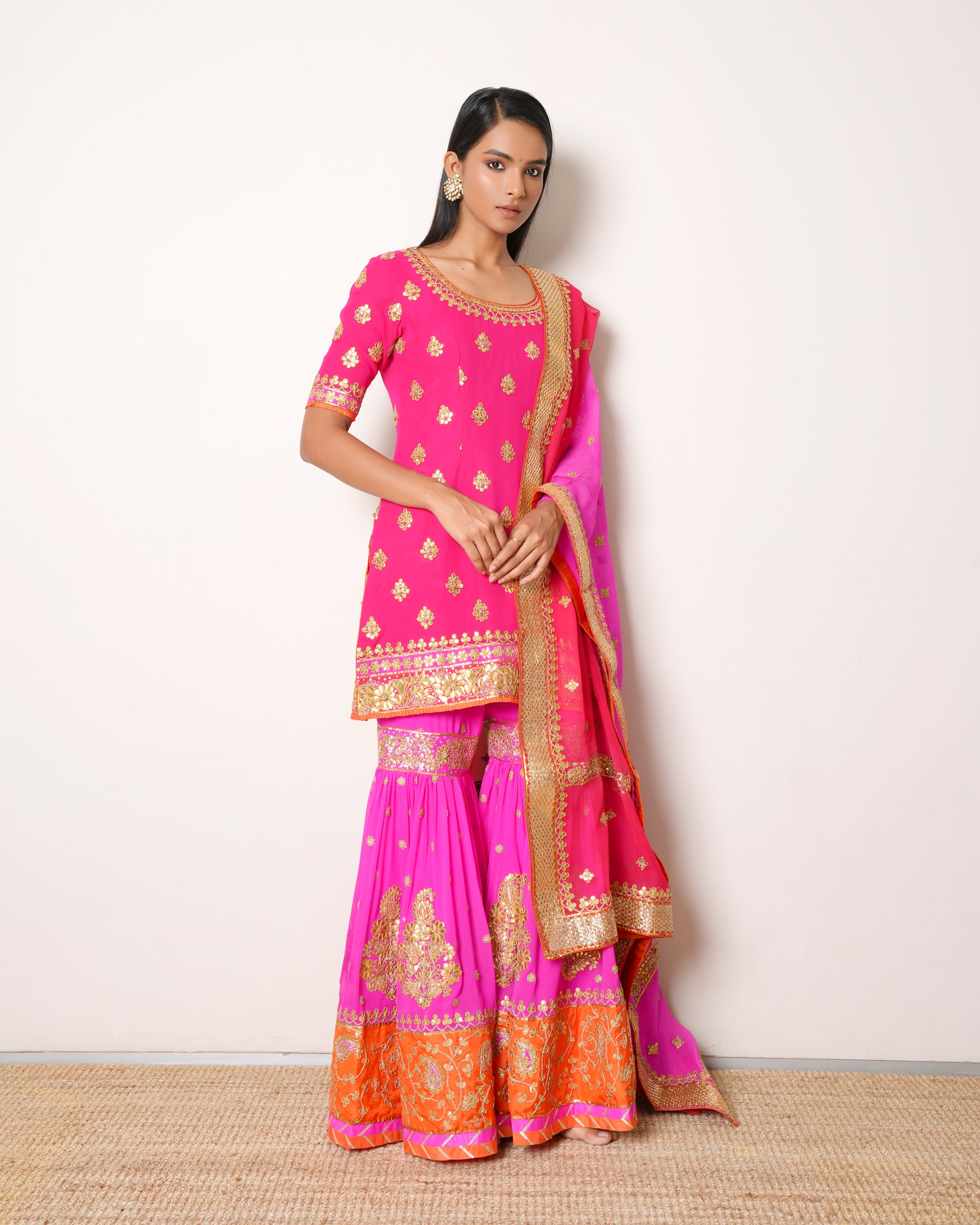 Saffron-Nidhi Tholia Pink Sharara Set With Gota Patti Work