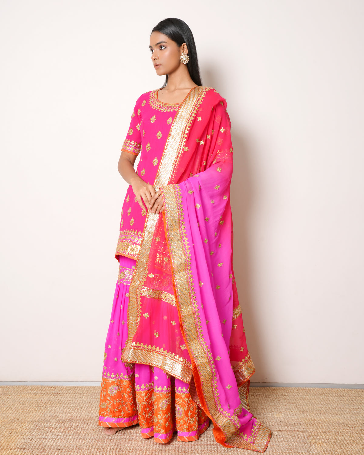 Saffron-Nidhi Tholia Pink Sharara Set With Gota Patti Work
